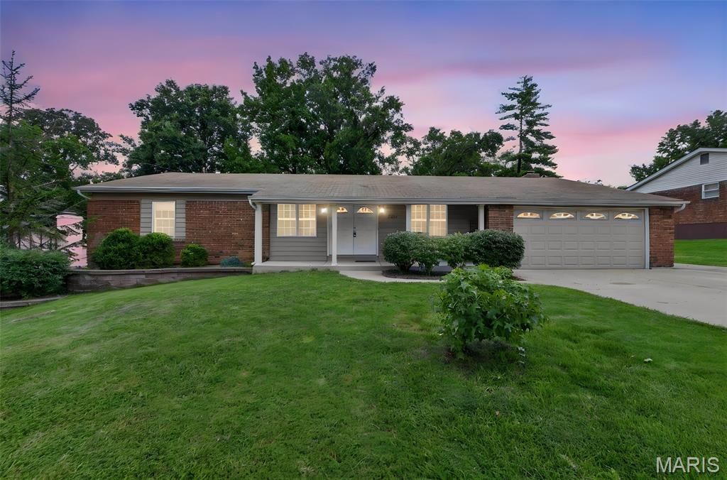 Large, all brick ranch in Rockwood Schools well under $400k! Tucked away in Ranchmoor subdivision in Ellisville on a quiet street. At over 1900 sqft, this 3 bedroom, 2 bath ranch has super spacious rooms!   This meticulously maintained home is ready to live in now, or is ready for a complete makeover. Just inside the front door is a formal living room and formal dining room. Beyond the dining room is the large, eat in kitchen that flows smoothly into the family room with cathedral ceilings and features a wood burning fireplace. The dry, full basement is just waiting for finishing to add even more living space. Kitchen and garage Refrigerators are included in sale! Not only is there a 2 car garage, but an oversized driveway with side parking spot for all your cars and outdoor toys!