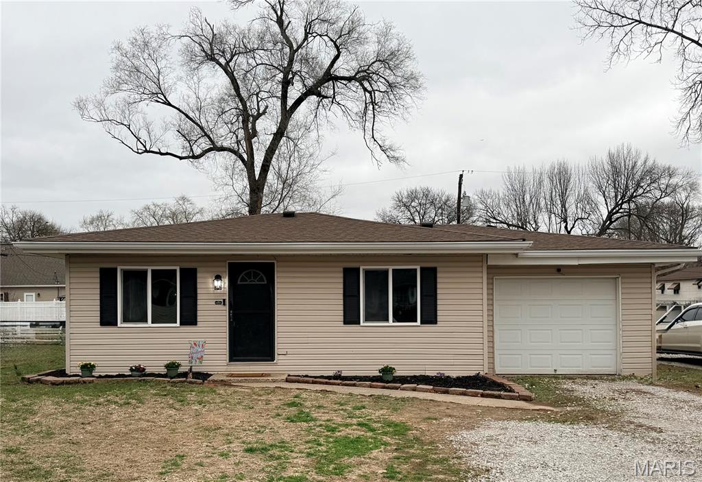 "Back on the Market - Better Than Ever!"
This charming 2-bedroom, 1-bath home in Wood River is move-in ready and refreshed throughout. New flooring was installed in 2026 and a new roof in 2020, giving you both style and worry-free living.
Inside, you'll find a bright, inviting space with updated finishes and an efficient layout designed for everyday living. The comfortable floor plan makes great use of every square foot while delivering a warm, welcoming feel.
Step outside to your private backyard retreat - a 13' x 26' patio and fire pit create the perfect setting for relaxing evenings or gathering with friends and family. The attached 1-car garage adds everyday convenience and extra storage.
This home has been fully protected from the ground up: the crawlspace has been professionally encapsulated with a vapor barrier and ventilation installed for peace of mind, and extended gutter drains direct water away from the foundation. A new gravel driveway off the alley adds convenient additional parking.
Whether you're a first-time buyer, downsizing, or simply looking for a low-maintenance property, this one checks all the boxes. Conveniently located near shopping, dining, and everyday amenities - this is a home you won't want to miss. 
Schedule your showing today! Home is virtually staged. Audio & video surveillance on premises. Property has a passed City of Wood River Occupancy Permit.