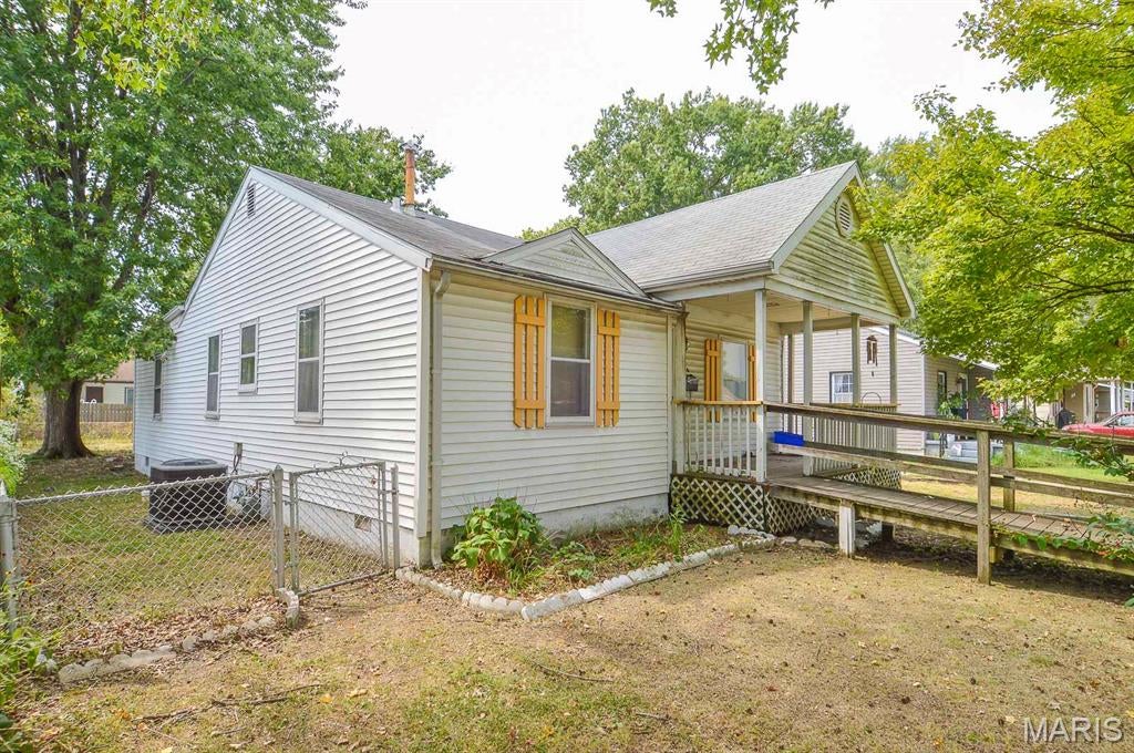 Price listed is Starting Bid Only. Bidding starts closing 9/30/2026 @ 6:30 p.m. Add to any real estate portfolio with this 3BR/1BA home featuring a partial basement and detached garage in Granite City, IL! Offering approximately 1,270± square feet of finished living space, this property provides a practical layout with plenty of potential. An existing ramp leads to the covered front porch, providing convenient access to the home. The front living room offers generous space for everyday living and could also accommodate additional dining space. The cozy kitchen includes an eat-in area, while three bedrooms share a full bathroom conveniently located off the hallway. A dedicated laundry room also houses the refrigerator, with all appliances included in the sale. The partial unfinished basement houses the home’s utilities and provides extended storage space. Outside, the fully fenced backyard features a chain-link fence, creating a defined outdoor area for a variety of uses. A detached garage adds additional storage and utility to the property. With its functional layout and existing amenities, this home offers an opportunity to add value to a real estate portfolio. Property will sell under auction terms and be sold AS- IS, WHERE-IS. Seller, will not make any repairs as a result of any building, occupancy, or environmental inspections. Buyer will be required to sign an Auction Purchase & Sale Agreement if final bid is accepted by Sellers.