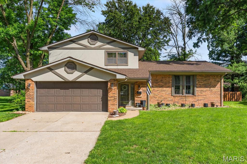 Modern design with warmth, charm and elegance!  Updated throughout, this 3 bedroom 2.5 bath home located near the heart of Millstadt is the epitome of style.  The entryway welcomes you home with a sitting & storage area for that end of the day ‘ahhhh’ moment.  The main level is smartly designed with a powder room, huge family room with a gas fireplace, plus sliding doors which take you outside to the backyard oasis.  Taking a few steps up to the amazing and spacious dining room and kitchen overlooking the family room, the kitchen is  cleverly laid out and generously appointed with updated sleek style, a large kitchen island and an abundance of cabinetry and the dining room is easily roomy enough for any large gathering. The primary ensuite has plenty of closet space and an updated full bath with a walk-in shower.  All of the bedrooms are light and airy and with the second full bath, any guest would feel at home here.  The basement has a storage room,  a large laundry room and plenty of room for a recreation area.  This home has an impressive private back yard.  Complete with covered patio, storage and extended patio perfect all your entertaining needs.  Make this home your own and experience the style, modern comfort of a beautiful home in a location which offers easy access to all local amenities!