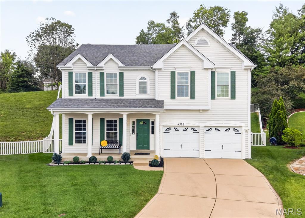 You won't want to miss out on this meticulous home that looks like a page from a magazine. You'll love the maintenance free exterior, beautiful curb appeal, and quiet cul-de-sac before you even walk inside. Walk inside and notice how tastefully designed and decorated this home is throughout. The front room, currently being utilized as a home office, could also be a formal dining room if desired. The large great room features 9 foot ceilings, a ton of natural light with the floor to ceiling windows, and a wood burning fireplace. The dining area opens up to the beautiful kitchen featuring a ton of cabinetry, granite countertops, stainless appliances, large pantry, and center island. Main floor laundry. Walk outside through the sliding door in the dining area to the large deck overlooking the fenced yard. The lot is over 1/3 acre and extends beyond the fence line. A half bath completes the main level. Upstairs you will find 3 spacious bedrooms and a loft area (possible 4th bedroom). The primary suite is massive with a walk in closet and ensuite. The unfinished lower level, currently used for storage, has a ton of potential for future square footage with a rough in bath, tall ceilings, and upgraded electric. The 2 car attached garage is also fully finished and the property features a lawn sprinkler system. Some newer windows and an upgraded HVAC in the last few years.