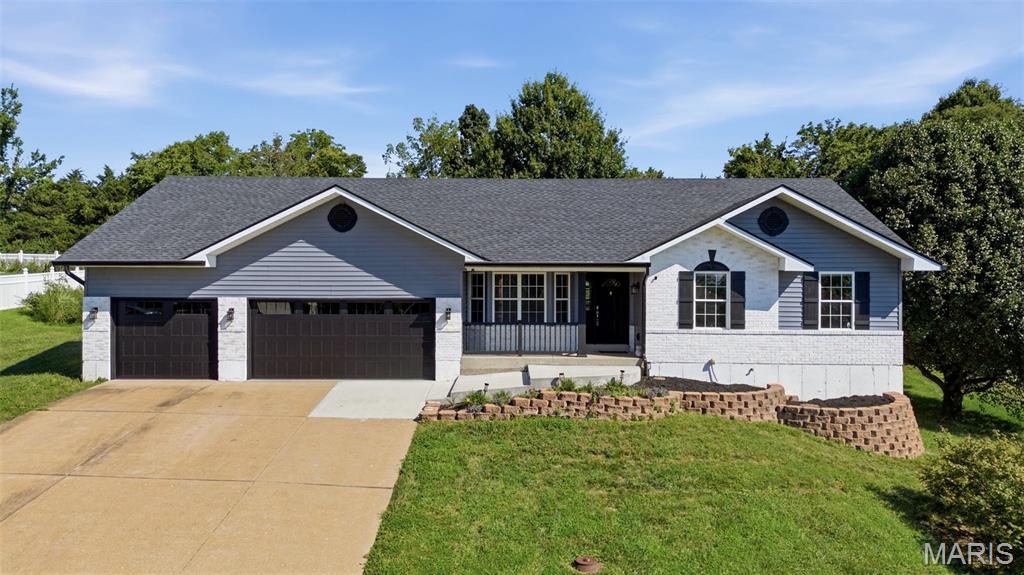 Welcome home to this beautifully updated 3-bedroom, 2-bathroom ranch featuring vaulted ceilings, an inviting open feel, and an impressive list of updates. The refinished kitchen showcases shaker-style cabinetry, stainless steel appliances, and durable Corian countertops, with a breakfast area that flows seamlessly to the backyard patio. Enjoy outdoor living under the pergola while overlooking the peaceful wooded private backyard. Both bathrooms have been thoughtfully updated. The lower level provides additional living space with a spacious family/rec room and convenient half bathroom—perfect for entertaining, relaxing, or creating a flexible living area.
Additional highlights include an oversized 4-car garage, two 200-amp electrical panels, and roof, siding, guttering and downspouts updated in 2026. With its combination of modern updates, generous living space, exceptional garage capacity, and tranquil wooded setting, this ranch home offers comfort, functionality, and plenty of room to enjoy.
