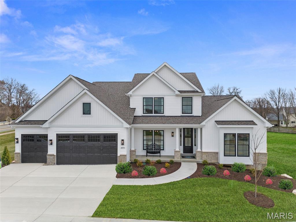 For limited time take 25,000 in flex cash toward your new home.The Bridgeport from Rolwes Company’s Estate Series is a magnificent one-and-a-half-story home that perfectly blends luxury, functionality, and modern design. This to-be-built floor plan features four bedrooms and three-and-a-half bathrooms, offering a spacious and open layout ideal for today’s lifestyle. At the heart of the home is a chef’s kitchen with an oversized island, generous storage, and Whirlpool appliances, with an optional gourmet configuration featuring double ovens and a cooktop. The adjoining breakfast area, dining room, and hearth room create a seamless flow that’s perfect for entertaining or relaxing with family. The main-floor owner’s suite is a true retreat, featuring a spa-inspired bath and a stunning walk-in closet. Upstairs, a cozy bonus room provides additional gathering space, along with three secondary bedrooms—including one with a private bath and two connected by a Jack & Jill bath—offering comfort and privacy for family or guests. Personalize your Bridgeport with options such as vaulted or coffered ceilings, a private study, bay windows, or a hearth room fireplace. Select floor plans can accommodate extended garages for boat storage, and the spacious homesites allow room for an optional detached garage. As part of the Lake St. Louis Community Association, homeowners enjoy full lake rights, clubhouse access, on-site dining, and community beaches, with additional amenities such as golf, tennis, pickleball, fitness center, and pool access available. Every Rolwes Company home includes enclosed soffits and fascia, a fully sodded yard, and a professional landscape package for lasting curb appeal. Images shown may reflect optional features. Please see your Sales Representative for a complete list of included features and community details.