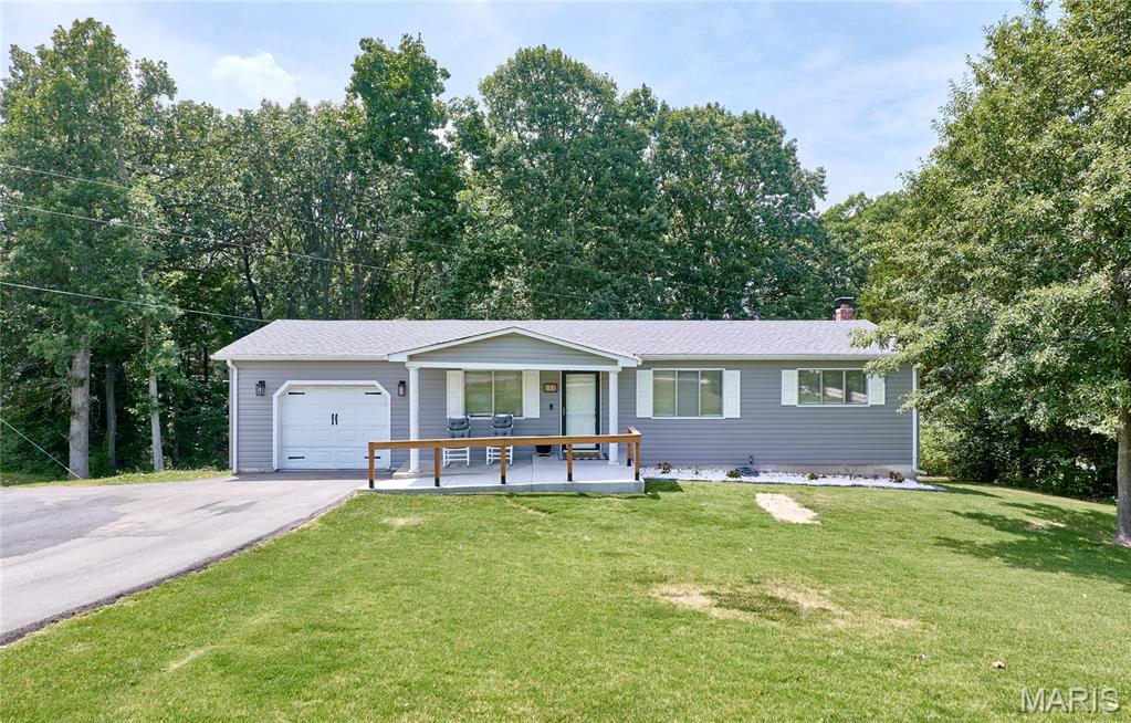 Welcome home to this charming 3-bedroom ranch nestled on a spacious corner lot in Troy! Situated on over 3/4 of an acre, this property offers the perfect blend of comfort and convenience. Inside, you'll find luxury vinyl plank flooring throughout, fresh paint and updated baseboards, along with a beautifully renovated kitchen featuring updated cabinetry, countertops, sink, and appliances - ready for everyday living and entertaining. Throughout the sellers' ownership, numerous additional improvements have been completed, including the roof, siding, asphalt driveway, porch ramp and railing, walk-in shower, toilet, water heater, water service line, ceiling fans, blinds, and landscaping, providing added value and peace of mind. The walkout unfinished basement features an updated sliding glass door, a cozy wood-burning fireplace, and some framing already in place - offering a head start on creating the additional living space you've been dreaming of. Complete with a 1-car attached garage and a storage shed, this property offers plenty of room both inside and out. Don't miss your chance to make this move-in-ready home yours!