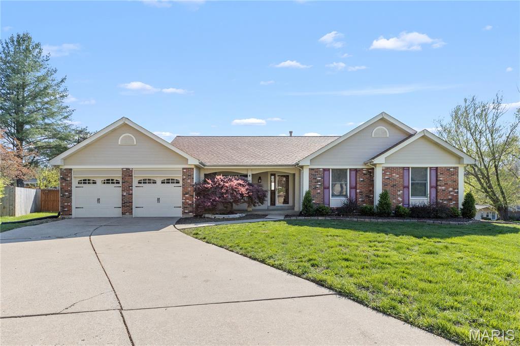 GREAT HOUSE! This beautiful property is located in a cul-de-sac in the heart of St. Charles County! The property features wood trim throughout, hardwood floor in the foyer and vinyl flooring throughout the rest of the main level. The VAULTED LIVING ROOM features a fireplace and exposed wood beams with TONS of natural light. The living room flows into the dining area with a gorgeous bay window brining in more natural light. The living room steps out onto the concrete patio in the FENCED IN BACKYARD with plenty of room for play/activities. The property features MAIN LEVEL LAUNDRY/mudroom adjacent to the HUGE 2 CAR GARAGE. The main level boasts almost 2,000 sqft of living area with 3 bedrooms and 2 full bathrooms, one of which being the primary suite with a dog shower. The HUGE semi-finished basement allows for you to finish to your specifications if you'd like or leave it as ample storage space. THIS WON'T LAST LONG!!! SCHEDULE YOUR SHOWINGS TODAY!!!