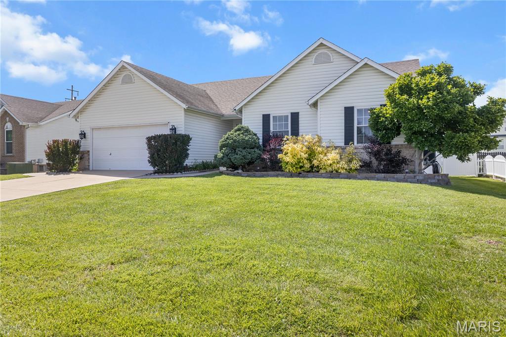 Wow!  Welcome to this 3 bedroom/2 bath ranch in a prime location of O'Fallon.   As soon as you pull up, you will be in awe of the gorgeous landscaping and curb appeal.   As you walk in the front door you will see how bright and warming this open, spacious floor plan is.   The living room has vaulted ceilings and a gas fireplace (could be covered to wood burning very easily).   The kitchen has been remodeled a few years ago and has gorgeous cabinets and granite countertops, along with SS appliances.   All the floors have pergo like floors (no carpet - except going downstairs).   The back yard is a park like setting with lush landscaping and a built in projector (that stays!), covered patio, gazebo, shed and new patio door.   And the subdivision has a clubhouse & pool.   Perfect for little ones.  There is so many upgrades...  This will go fast!