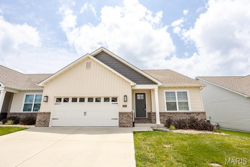 Welcome home to this spacious 3-bedroom, 2-bath villa in the desirable Fountain Place community! Situated on the lake, this move-in-ready home offers beautiful water views and easy, low-maintenance living. The open kitchen and living room create a comfortable space for everyday living and entertaining. The kitchen features a center island and stainless steel appliances, including the refrigerator, electric range, and dishwasher. Sliding glass doors lead to the covered deck overlooking the lake—perfect for morning coffee or relaxing at the end of the day.

The primary suite offers a private bath with a double vanity and a walk-in closet. Two additional bedrooms provide plenty of space for family, guests, or a home office. The full walkout basement is unfinished, offering excellent storage and endless potential for additional living space.

Additional features include a main-floor laundry room and a two-car attached garage. The HOA covers lawn mowing and snow removal, making it easy to enjoy everything this home and community have to offer. If you've been looking for a well-maintained villa with great views and room to grow, this one is a must-see!