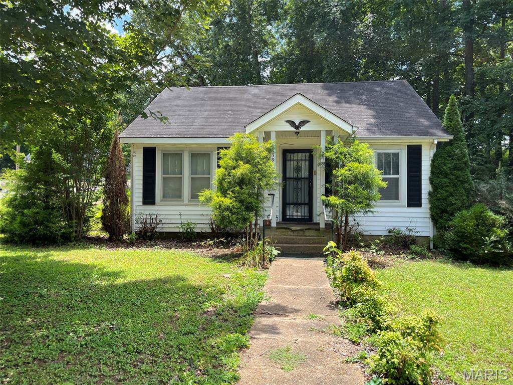 Discover the charm of a bygone era with this inviting single-family residence, located at 139 Walnut St, Greenville MO 63944. Built in 1950, this home offers a unique opportunity to embrace a lifestyle of comfort and community in a classic setting. Two bedrooms, one full bath, combination kitchen/dining, utility room, covered front porch, all on a large yard with shade trees. This is more than just a house; it's an invitation to cultivate your ideal life in Greenville. Contact us today to arrange your private viewing and envision the possibilities.
