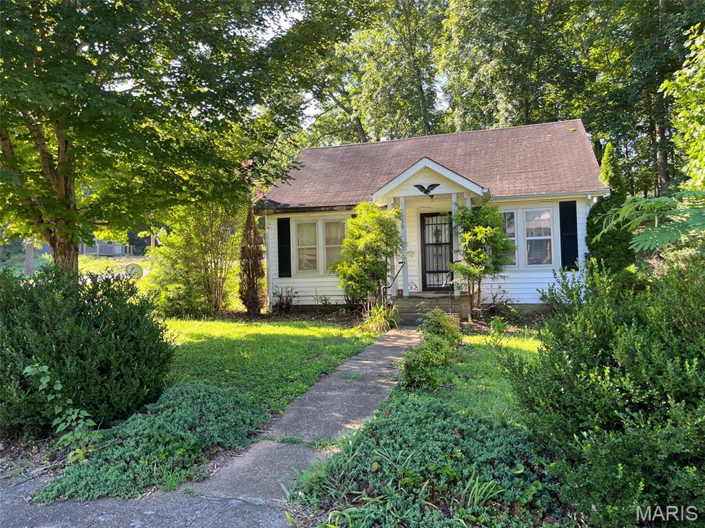 Discover the charm of a bygone era with this inviting single-family residence, located at 139 Walnut St, Greenville MO 63944. Built in 1950, this home offers a unique opportunity to embrace a lifestyle of comfort and community in a classic setting. Two bedrooms, one full bath, combination kitchen/dining, utility room, covered front porch, all on a large yard with shade trees. This is more than just a house; it's an invitation to cultivate your ideal life in Greenville. Contact us today to arrange your private viewing and envision the possibilities.