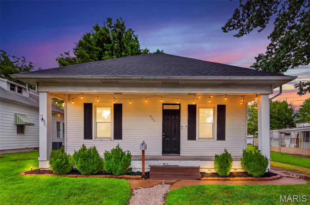 Charming 2 bedroom, 1 bath home in the heart of Dupo! Step inside to a welcoming floor plan featuring a bonus sunroom that offers additional living space and plenty of natural light. One bedroom features brand new carpet, adding a fresh touch. Outside, you’ll love the covered front porch and nicely shaded backyard, perfect for relaxing or entertaining. The oversized 2 car garage provides plenty of room for vehicles, storage, hobbies, or a workshop. Conveniently located near local schools and amenities, this adorable home offers great space, character, and functionality. Come see all it has to offer!