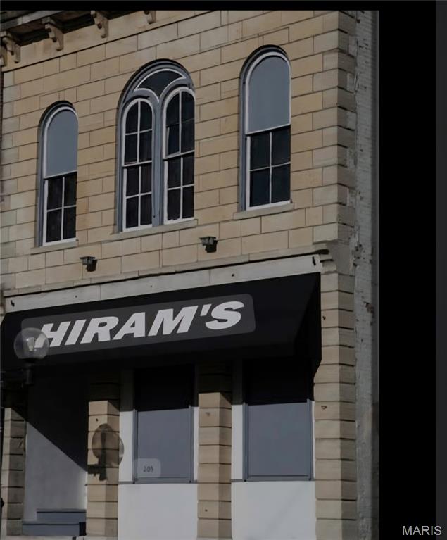 A great opportunity to own a piece of downtown Alton! The options are endless with this property. The main level is wide open and ready for your ideal business. The upstairs has an open floor plan loft with a kitchenette and bathroom.