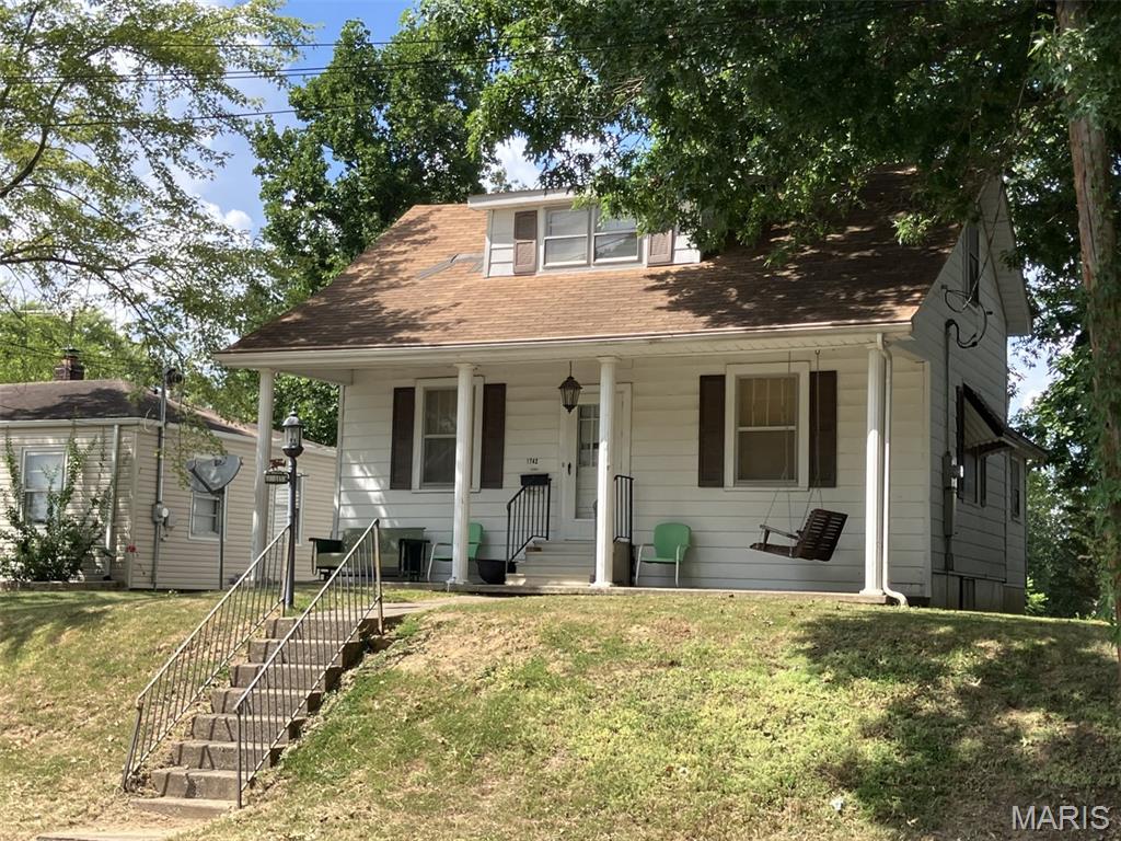 1.5-story vinyl-sided three-bedroom, one bath home with detached garage-workshop area.
Minutes from Semo University and the amenities of town. This home could serve multiple purposes, such as a college rental for an investor or for parents looking for college housing, or a single-family residence that would make a great starter home for a first-time homebuyer.