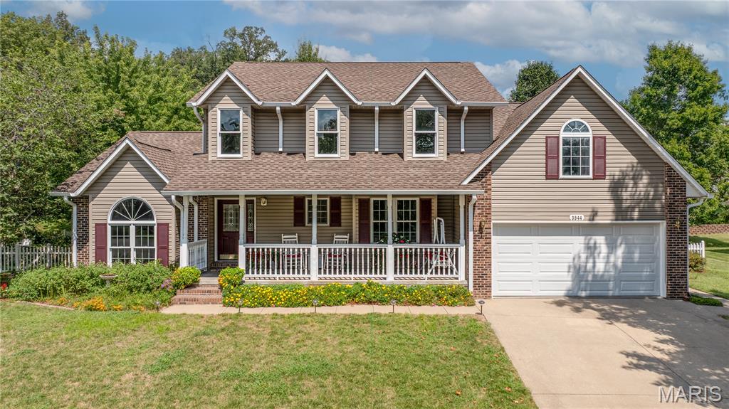 Tucked away on a quiet cul-de-sac, this spacious 5-bedroom home has been refreshed and is ready for its next chapter! With new flooring, fresh paint, new roof, and new siding. After entering from the welcoming front porch, inside, you'll find a main-floor bedroom plus 4 additional bedrooms upstairs, giving everyone plenty of space. The home offers multiple living areas, including a sunken living room with a beautiful atrium window, bringing in an abundance of natural light. Formal living room, dining room, breakfast area and a cozy family room with gas fireplace just off the kitchen - perfect for everyday living and entertaining. The kitchen has also been refreshed and has great layout with center island. The spacious 2nd floor offers lots of living space + with 4 bedrooms and 2 full baths upstairs. The full basement can be extra space for storage or if additional room is needed - also a dry basement - no water with this rainy season we have had. Step into the charming white picket-fenced backyard, beautifully landscaped with so many flowers and plants, ready for relaxing, entertaining, or enjoying a quiet evening outdoors. With its desirable location, generous bedroom sizes, fresh updates, multiple living spaces, and COMPLETELY move-in ready you'll want to see this one FAST!