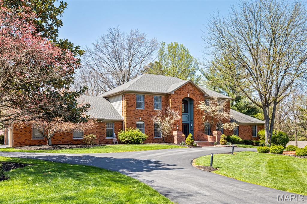 Set on a beautiful 1-acre lot, this all-brick traditional home is in sought-after Ladue Aire Estates. Enter to find a welcoming 2-story foyer leading to the LR, DR, and fabulous FR with substantial woodwork including a coffered ceiling, built-ins, brick FP shared with the sunroom, and wet bar. The sunroom, with a cathedral ceiling, opens to the beautiful backyard & patios. The KIT includes a large breakfast room, Wolf appliances (gas cooktop, oven, convection/microwave, warming drawer), SubZero refrigerator & BEV FRIG. Also, on the main level is the primary BR suite with H/H closets, a large bath w/separate tub & shower & private WC. Completing this floor are two HA BAs, a spacious laundry room & access to the 3-car GAR. Upstairs find 3 BRs, 2 FU BA & a loft for office/study/play. The FIN BSMT has a sleeping area, full bath, TV area w/gas FP, built-ins, and bar. There is also a large rec room w/daylight WDWS & doors to the backyard. Located in Parkway Central Schools/Mason Ridge Elem. Additional Rooms: Sun Room