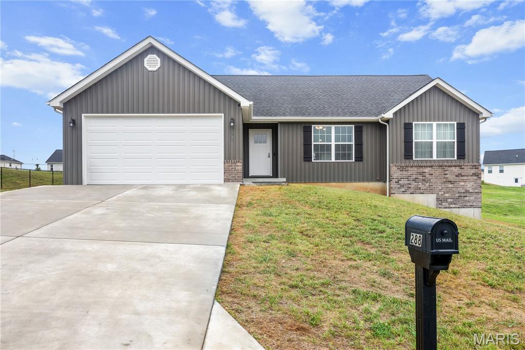 You do not want to miss this 1-year old gorgeous ranch home. This 3-bed and 2-bath beauty has so much to offer. As soon as you walk in, you feel the openness and will love the vaulted ceiling. You can't miss the quartz countertops, custom cabinetry, backsplash, and engineered wood floors. They are exquisite. The main floor laundry and primary bedroom suite are so convenient. The backyard is stunning with the large patio, gazebo, and usable large yard. The 40x10 patio and 12x10 patio & gazebo is an entertainer's dream. You will have access to the 6-acre subdivision lake! This is a great opportunity to buy a charming home less than 15 minutes from wonderful downtown Washington.