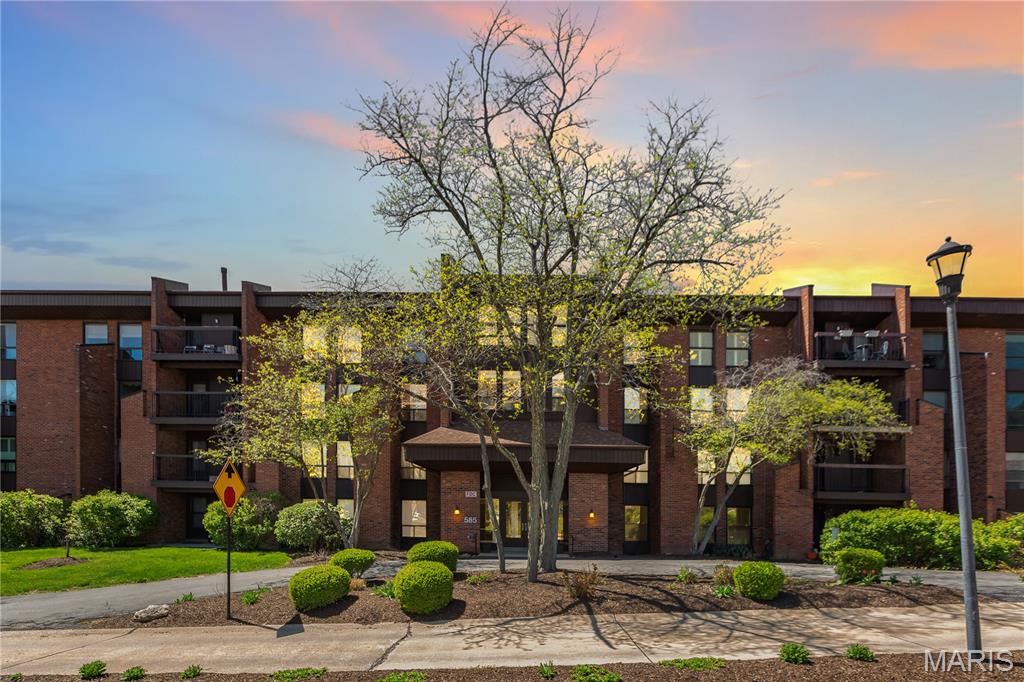 Welcome to this elegant and meticulously maintained condominium in the highly sought-after Coeur De Royale community. Boasting over 1,700 square feet of bright, open living space, this charming condo offers the perfect blend of style, comfort, and convenience.

As you approach the property, enjoy the beautifully landscaped grounds that lead to a welcoming entrance. After a quick elevator ride to the second floor, step inside and be greeted by a spacious foyer with a shelved storage room for added convenience.

The thoughtfully designed layout features distinct living and dining areas, ideal for both intimate gatherings and parties. The large, eat-in kitchen is a chef's dream, offering an abundance of cabinetry, extensive counter space, and multiple pantries. Plus, all appliances are included, even the stackable washer and dryer, making this home move-in ready!

Relax in the versatile family room, featuring a built-in wall unit with desk and lighting – perfect for a TV lounge, game room, or peaceful retreat. The beautifully appointed powder room completes the main living area with style and sophistication.

The spacious master suite offers a luxurious oasis, complete with a walk-in closet with custom closet organizer, and an ensuite bathroom featuring an expansive vanity, linen closet, soaking tub, and step-in shower.

Additional highlights include TWO assigned parking spaces in the heated garage, a private deck off the living room with serene views, marble flooring in the foyer and half bath, and premium Kohler and Moen fixtures. For added peace of mind, the condo includes a new 200-amp electrical panel and the correction of aluminum wiring throughout the unit in 2025. This building offers the exclusive convenience of a circle drive for easy pickups and drop-offs.

The Coeur De Royale complex has an array of fantastic amenities, including beautifully maintained landscaping, a refreshing swimming pool, tennis courts, BBQ grills, a clubhouse with kitchen, sauna, showers, and a Party Room overlooking the pool.
Ideally located within walking distance to popular restaurants, cafes, and shopping, this condo is also close to Creve Coeur Golf Course, parks, grocery stores, and essential services. With easy access to Highways 270, 64/40, and the Page Extension, commuting is a breeze.