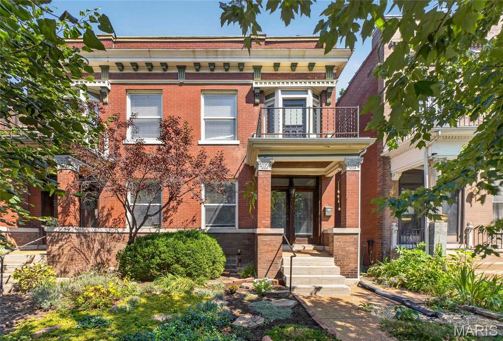 Welcome to this charming 2-story historic home in the heart of the sought-after Shaw neighborhood! From the moment you arrive, you’ll appreciate the beautiful original character, inviting covered front porch, and gorgeous wood entry doors. Step inside to gleaming hardwood floors and an abundance of natural light throughout the main level. The updated kitchen is a showstopper, featuring modern cabinetry, solid surface countertops, stainless steel appliances, tile backsplash, and an exposed brick accent that perfectly blends historic charm with today’s style. Upstairs, you’ll find 3 bedrooms, a full bathroom and not one but two second-story patios, offering unique outdoor spaces to relax and unwind. Out back, enjoy a deck, fenced yard, and convenient off-street parking. You will the czre & compassion of the lush rear & front landscaping! All of this in an incredible location near neighborhood restaurants, shops, parks, and everything the Shaw area has to offer. Historic character, modern updates, and a fantastic location come together in this one-of-a-kind home—don’t miss it!