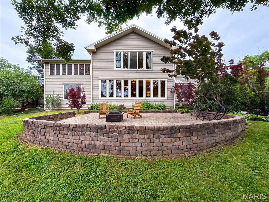 Welcome to one of Arcadia Valley‘s most unique and breathtaking properties nestled on 6.470 beautiful maintained acres in the heart of the Ozark foothills. Built early in Arcadia history this property has been lovingly, upgraded and expanded over the years, most recently in and around 2009-2014 with expanding living space and raising the ceiling height throughout this remarkable exclusive two-story home, seamlessly blends a historic character with modern comfort and functionality.
Offering 4 bedrooms, 4 full baths and an abundance of natural lighting throughout and featuring spacious living areas, multiple fireplaces, a custom designed kitchen with formal dining space, a media and gaming room, true library, with a full gymnasium, including a steam shower for after workout. The primary floor offers 2 exclusive master suites with individual full baths and a fireplace in each. upstairs are 2 additional bedrooms, and 2 additional full bathrooms for the family.
Standout features abound; one is a second story cedar paneled sunroom with removable windows to yield screened access to views of the property. This inviting space conveniently walks directly out private stairs to access the verandah which has been thoroughly upgraded to a 35 x 45 personal retreat encapsulated with a privacy wall, and an enclosing and outdoor fireplace shielded by a 10’ pergola and shaded by a beautiful wisteria. The stunning courtyard inspired by warm Mediterranean vibes, many conversational spaces, and entertaining possibilities abound included is an aspen spa.
There is an attached spacious 2 car garage, and a very large utility/laundry room with in floor drain for a perfect place to groom pets. Additionally, the 1800s triple Bay barn has been upgraded upgraded to modern expectations, with an additional construction of an out building for private hobby or gardening activities.
The property is fully fenced with a remote gate to open and shut on command, ensuring privacy and spacious yard for pets to roam. The property host mature various hardwoods about the property with a blend of Mulberry, fig, apple, and pear trees, including a very special reflection pool with a 30’  lightened flag pole, many personal retreat options creating a truly private retreat like atmosphere unlike anything else in the area.
Conveniently located near some of Missouri’s most sought-after outdoor destinations, this property places you in the center of endless recreation and adventures. Enjoy being just minutes from Elephant Rocks State Park, Shepherd Mountain biking trail, historic downtown areas, local shops, restaurants, and outdoor attractions. You’re also approximately 20 minutes from the Millstream’s Garden, Silver Minds, Marble Creek recreational area, with Johnson’s Shut Ins, and Goggins Mountain only a short drive away, offering camping, hiking, horseback riding, swimming and exploring.
Nearby attractions also include the Mark Twain national Forest, Bell Mountain, Council Bluffs Lake, Black River, and Clearwater Lake-perfect for boating, floating, fishing, camping and weekend getaways- all while still being conveniently located within reach a Farmington for shopping, dining, and everyday amenities. From the incredible outdoor living spaces to the rich history and the picturesque surroundings, this extraordinary Arcadia property offers far more than just a home. It’s a lifestyle and a private retreat you truly have to experience to appreciate.