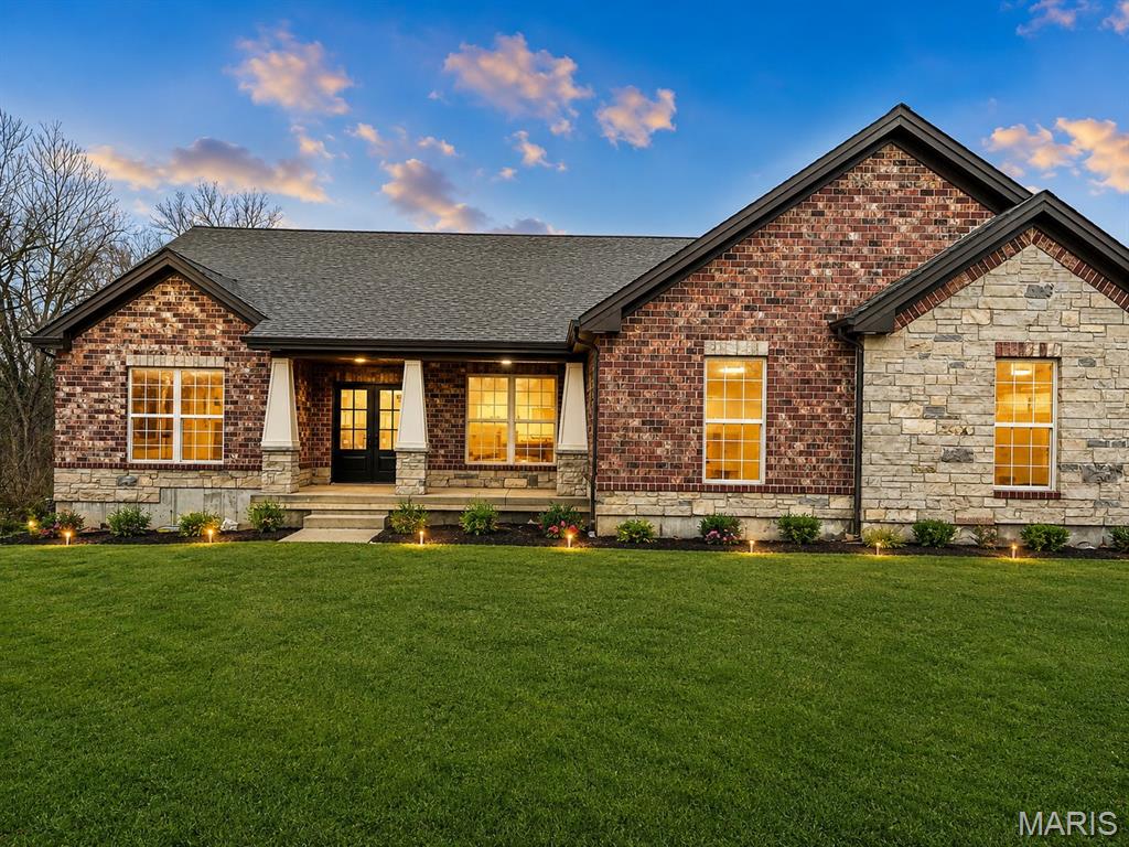New Home at Cobblestone Creek. Highlights of this new build:  Zero step entry from the oversized garage, 3 main floor bedrooms + study, an open design with expansive windows in the Great Room / Dinign,  covered deck, and 10' ceilings.  The finished lower level adds a rec room and 4th bedroom, full bath and walk out to the expanded patio. High ceilings, built ins, stone fireplace, upgraded flooring, upgraded trim and interior doors, Diamond level cabinets with oversized island, quartz tops, upgraded appliances with double wall oven, gas cooktop, added drawers, walk in pantry.  The primary suite includes walk -in, walk through laundry area and the bath features a tile / frameless glass shower, separate soaking tub, double vanity w quartz, linen closet,  Main floor laundry with cabinetry.  The elevation planned shows off brick / stone, hip roof, side entry garage)

Buyers will choose exterior and interior colors. Northern Star Homes will make some design variations to truly customize this home.

Northern Star Homes is your hometown builder in Washington, Missouri.

Cobblestone Creek is located just outside of Washington and is a premier community with large homesites.  More models are available to view at Stone Bridge (located just off Bieker Road).