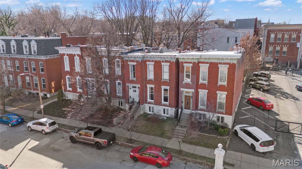Charming 2 bed, 1 bath rental nestled in the historic Lafayette Square neighborhood of St. Louis City.  This main level unit features exposed brick, 10' ceilings, an updated kitchen, central air, in-unit washer/dryer and so much more. A deck sits off the back of the unit, just outside of the primary bedroom, giving you additional space to entertain or just a spot to sit and enjoy your fenced in yard. There is a concrete parking pad at the back of the lot for off street parking. This is an extremely convenient location, just minutes from several parks (Lafayette Park, Forest Park, Tower Grove/Botanical Gardens), Busch Stadium, CityPark, IKEA, Top Golf and all of your favorite restaurants and entertainment venues. Pets allowed (additional fees may apply).  No smoking or prior evictions.  Income must equal or exceed 2.5x monthly rent.  This unit is available immediately.  Online application available.