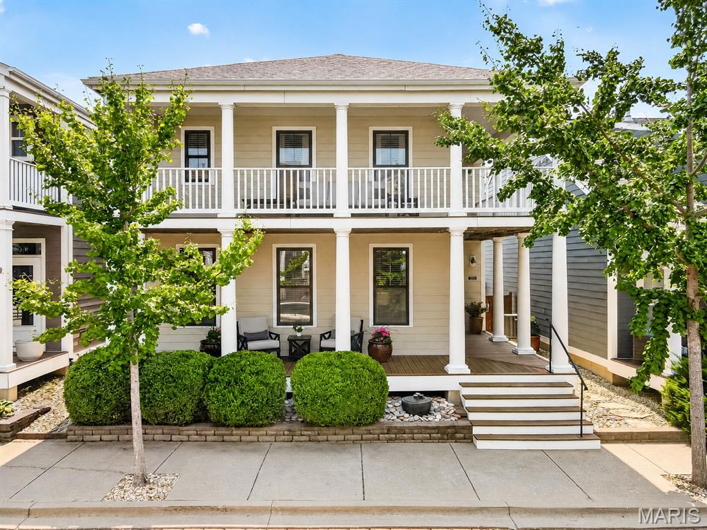 Meticulously maintained, extensively updated, and truly move-in ready, this exceptional New Town residence is a rare find where timeless architecture meets the confidence of major recent improvements. Built in 2012, this stunning 4-bedroom, 3.5-bath home offers approximately 2,772 sq. ft. of beautifully finished living space. From its signature double front porches to its pristine interior and private courtyard, every detail reflects an extraordinary level of care.

Step inside to soaring 9' main-level ceilings, abundant natural light and engineered hardwood flooring flowing throughout the beautifully updated main and upper levels. The spacious living room is anchored by a gas fireplace, creating an elegant yet inviting gathering space. The main and upper floors underwent an extensive renovation in 2020, including a full kitchen remodel, engineered hardwood flooring, upgraded lighting and hardware, and fresh paint.

At the heart of the home is a beautifully remodeled kitchen appointed with 42" cabinetry, granite countertops, Wolf gas range and hood, Bosch refrigerator and dishwasher, and a center island. A dedicated butler's pantry/coffee bar and oversized walk-in pantry with custom wood shelving elevate both the form and function of the space. Main-floor laundry with added cabinetry and a stylishly updated powder room complete this thoughtfully designed level.

Upstairs, retreat to the spacious primary suite with a beautifully remodeled bath featuring a tiled walk-in shower, double vanity and separate soaking tub, plus a walk-in closet outfitted with custom organizers. Two additional bedrooms, an updated full hall bath and versatile loft provide plenty of room to spread out. From the loft, step directly onto the expansive second-story covered balcony—the perfect place to unwind.

The finished lower level was fully remodeled in 2023 and offers an impressive extension of the home's living space with new flooring, lighting and finishes. A generous recreation room, fourth bedroom/office and full bathroom make this level ideal for guests, a home office, fitness space or additional entertaining area.

Outside, the private courtyard feels like an extension of the home, featuring a spacious patio, bistro lighting, fenced green space, and access to the detached 2-car garage with alley entry. The wood fence was added in 2022 and freshly stained along with the gates in July 2026.

Even more impressive is the extensive list of major improvements already completed: roof replaced in 2024, new 4-ton HVAC system and new water heater in 2025, radon mitigation system, water softener and filtration system, updated exterior maintenance and more.

All of this is set within sought-after New Town, where residents enjoy access to community lakes, beach, pool, common grounds and more. Exceptionally cared for, beautifully updated and thoughtfully improved from top to bottom, 3253 Camp Street delivers the character of New Town with a level of condition and finish that is increasingly difficult to find.