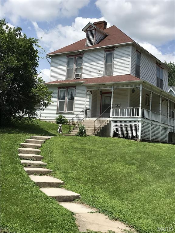 Investor Special – Rehab Needed! Motivated Seller
Your opportunity to get an affordable Circa 1880 two-story with character located within walking distance to downtown. Offering 4 bedrooms, 2 full baths, and 2,032 square feet of living space. Priced to sell with room in your budget to put some personal touches of your own! Will need new roof and ceiling in Kitchen and main floor bath. Spacious interior with open living and dining room and den.  The spacious, detached 2-car garage offers ample room for vehicles, storage, or a workshop. Seller is in process of removing personal items. Home is being sold "as is", inspections for informational purposes only. ***Property has experienced significant roof leaks. Evidence of water intrusion is present. Mold may be present due to moisture conditions. Buyers and agents should exercise caution when viewing and are encouraged to conduct any inspections they deem necessary. ***Please sign the Property Condition Acknowledgement prior to viewing