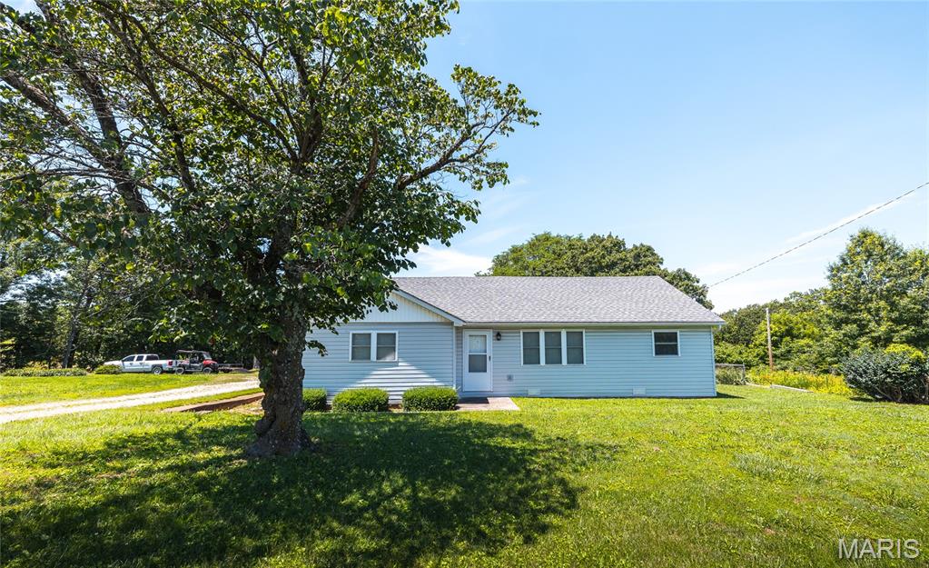 Rare opportunity on approximately 17 wooded acres with roughly 1,000 feet of Bourbeuse River frontage in Franklin County, conveniently located just minutes from Union and under an hour from St. Louis. The 3-bedroom, 1-bath home has been meticulously maintained and offers a clean, move-in-ready option. The property’s Highway 47 frontage and commercial zoning add exceptional flexibility, making it an ideal location for a business, storefront, office, or rental use with high visibility and easy access. The land features mature hardwood timber, rolling terrain, and a perfect spot toward the back of the property for a future home or cabin. Electric is already available at this location, offering a ready-made opportunity for a dream build overlooking the Bourbeuse River. A trail winds through the timber down to the water’s edge, providing easy access for fishing, kayaking, and enjoying the river. The property offers strong recreational appeal with abundant wildlife and a peaceful natural setting along the river. Additional improvements include a 1,200 sq ft detached garage with workshop space and an unfinished basement, providing extra storage and utility space. With its combination of river frontage, recreational opportunity, commercial potential, and future build sites, this is a truly versatile property with endless possibilities in a highly desirable location. Call today to schedule a showing!