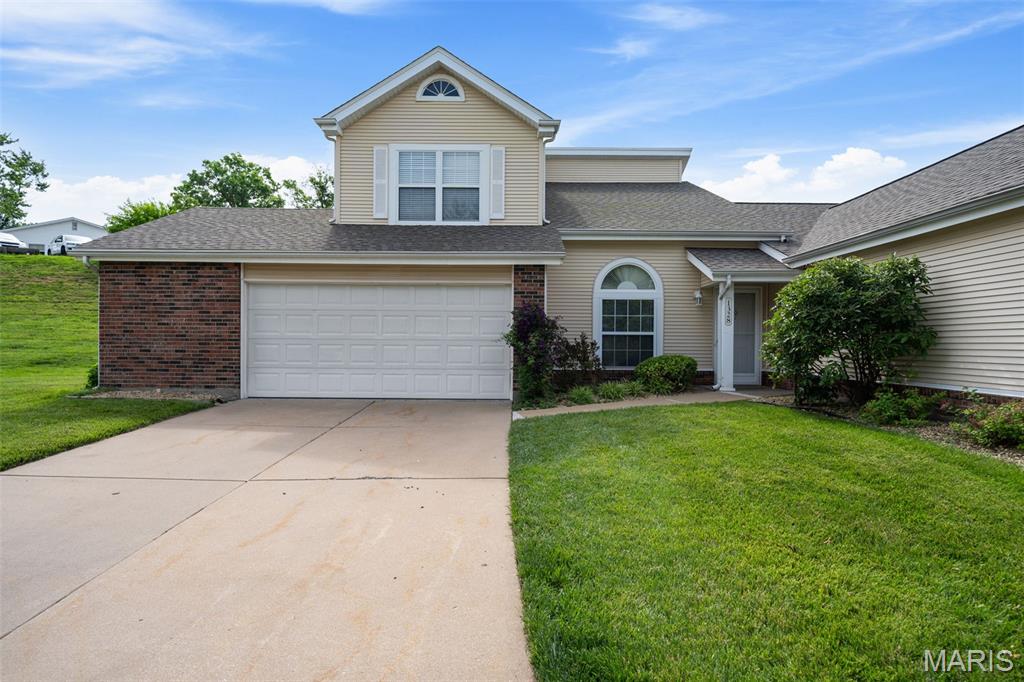 Open House, Saturday, June 6th, 11-1 pm! Ready for a lifestyle that lets you spend more time enjoying life and less time maintaining it? Welcome to this beautifully designed, low-maintenance villa offering over 1,400 square feet of comfortable living space in a desirable St. Peters community. From the moment you step inside, you'll appreciate the soaring vaulted ceilings, open-concept floor plan, and abundance of natural light that create an inviting and spacious atmosphere. The large living and dining areas flow seamlessly together, making everyday living and entertaining effortless. The sun-filled eat-in kitchen offers plenty of space for meal preparation and casual dining, while double doors lead to a private patio perfect for morning coffee, evening BBQs, or simply relaxing outdoors. Stainless steel appliances are included, making this home truly move-in ready. Convenient main-floor laundry with a built-in office nook adds functionality, while generous closet space throughout provides exceptional storage. Upstairs, you'll find two spacious bedrooms featuring vaulted ceilings and large closets. The shared bathroom is designed for comfort with a separate soaking tub and shower. Additional highlights include solid wood doors throughout, an oversized two-car garage with extra storage space, and an end-unit location that provides additional green space and privacy. Best of all, the community pool is just a short stroll away—perfect for enjoying summer days with family and friends. The HOA handles exterior maintenance, landscaping, and snow removal, allowing you to enjoy a truly carefree lifestyle. Conveniently located near Page Extension, shopping, dining, parks, and all the amenities St. Peters has to offer, this villa delivers the perfect combination of comfort, convenience, and low-maintenance living. Welcome home!