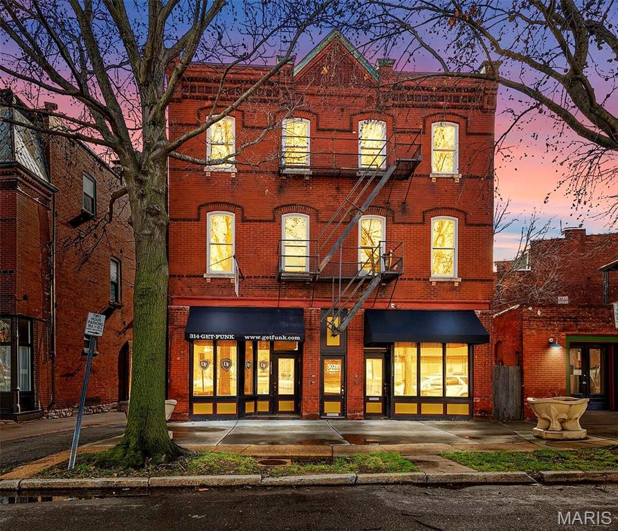 Welcome to 3024 S Jefferson, a partially renovated, historic mixed used building located in the roaring Benton Park neighborhood of South St. Louis City! Zoned for retail & residential usage, you get the best of both worlds! 1FL and 3FL are furnished and leased as mid-term rentals. On the first floor, you are greeted by new hardwoods inviting you to an open, bright floor plan. Exposed brick, great natural light & ambient light fixtures gauges the eye. Living room & dining area are graced with space for entertaining. The commercial kitchen is GORGEOUS: stainless steel appliances, hood system, range & backsplash are a sight to see! A full bath & bonus office/bedroom complete the 1st FL. Head upstairs to find 3 residential units which feature a 3rd FL penthouse suite. The penthouse suite includes 3 bedrooms, 2 full baths & in-unit laundry. Two updated one bedroom units complete the 2nd FL! Perfect for retail, residential & short term rentals. Truly an investors dream! Just a 30 second walk to Benton Park. A rare opportunity to live/work/invest right across from Benton Park!
