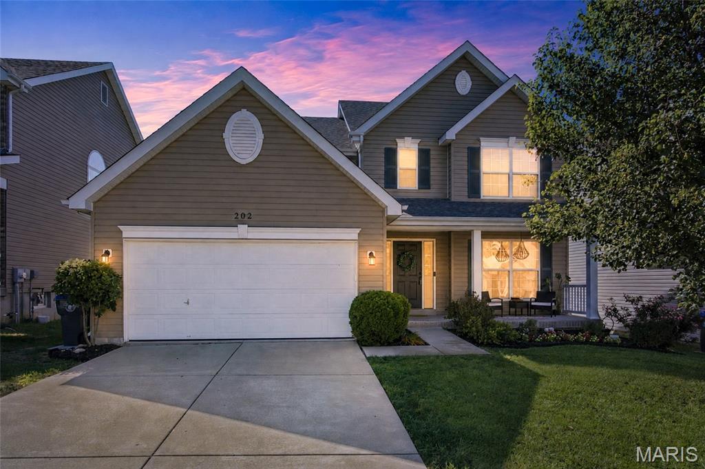 Welcome to Wyndgate! Now offered at $485,000.  This beautifully maintained 5-bedroom, 3.5-bath home offers over 3,300 sq. ft. of finished living space. The finished lower level sets this home apart with a true fifth bedroom, full bath, private office, recreation room, bar, and abundant storage—ideal for guests, hobbies, or multi-generational living.

The main level features a welcoming foyer, versatile office, formal dining room, and bright great room with custom shelving, decorative fireplace, and open-concept flow. The spacious kitchen offers abundant cabinetry, large butterfly island, pantry, and sunny breakfast area. Mudroom/laundry, updated powder room, and newer LVP flooring complete the main level.

Upstairs, the generous primary suite includes a walk-in closet and private bath with dual vanities and tub/shower. Three additional oversized bedrooms, updated hall bath, and newer carpeting provide plenty of space and comfort.

Enjoy the backyard patio, attached garage with EV charger, and all the amenities Wyndgate has to offer, including a pool, pickleball courts, playground, and trails. Conveniently located near shopping, dining, and major highways and within the Liberty High/Wentzville school district. Move-in ready and packed with value—don’t miss this exceptional opportunity!