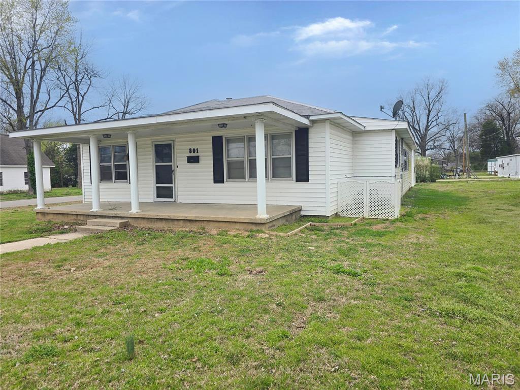 This property offers everything an outdoor enthusiast could want! From the moment you arrive, you’ll notice the impressive detached garage/shop, large enough to accommodate a camper or smaller RV, complete with electric hookup and dump station for added convenience. The adjoining covered area has great potential for an outdoor kitchen—perfect for cleaning your fresh catch, processing game during hunting season, or creating the ultimate space for cookouts and entertaining family and friends.

Situated on a desirable corner lot, this spacious 4-bedroom, 1.5-bath home offers both charm and functionality with plenty of room to grow. The attached one-car garage leads into a cozy yet spacious family room, converted from one side of the original two-car garage, creating the perfect gathering space. Just off the family room, the flexible dining area or study features a beautiful brick gas fireplace that adds warmth and character. The kitchen includes updated appliances, classic cabinetry, and abundant storage, along with a large walk-in pantry designed for easy organization. A second full bathroom has already been plumbed and includes materials needed for completion, giving the next owner a fantastic opportunity to add value and make it their own.
 
While the home could use some TLC, it offers great bones, ample space, and endless potential.

Whether you're looking for your next family home or a smart investment, this property is worth a look.