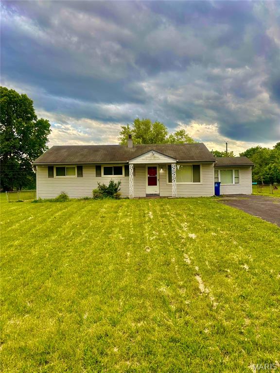 Discover the potential in this spacious 4-bedroom, 2-bath home nestled on a beautiful half-acre lot that backs directly to Larimore Park. With over 1,300 square feet of living space, this home offers a bright, open layout featuring updated luxury vinyl plank flooring, neutral tones throughout, and generously sized bedrooms. The large backyard is ideal for entertaining, gardening, or simply enjoying the quiet, park-like setting.

Perfect for owner-occupants or investors, this home presents an excellent opportunity to personalize and add value with a few finishing touches. Conveniently located near schools, shopping, and highway access—this is a solid property with long-term upside. No municipal inspections will be completed by the seller. Seller will not provide any inspections or warranties. Property to be sold in as-is condition.