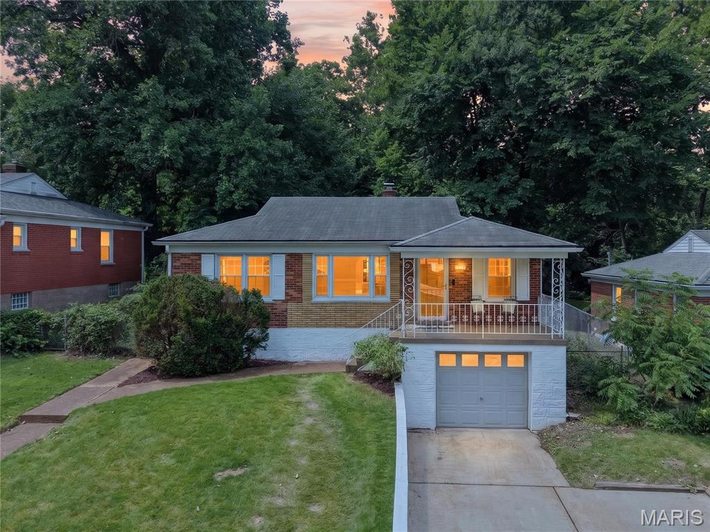 Welcome to 1625 Salem Hills Drive! This charming 2 bedroom, 2 bath home is filled with natural light, beautiful hardwood floors, and timeless character. Fresh paint throughout and updated fixtures create a bright, inviting atmosphere while preserving the home's warmth and charm. The spacious rear family room is the perfect place to relax, gather, or entertain, offering lovely views of the large backyard. The lower level features a versatile bonus room that can easily serve as a home office, workout space, playroom, or additional living area. Additional updates include a new air conditioner installed in 2024. Conveniently located in the Webster Groves School District, this move-in ready home offers comfort, flexibility, and charm both inside and out.