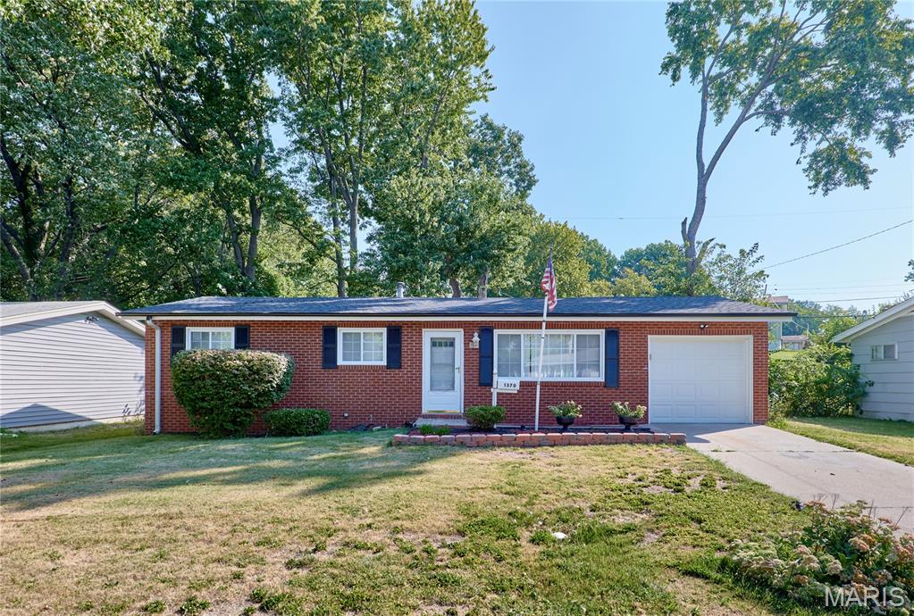 Move right into this beautifully renovated 3-bedroom, 2-bath brick ranch with an attached garage.  Welcome to this charming home featuring excellent curb appeal and a flat front lawn. The cozy living room with gleaming hardwood floors, a gorgeous statement chandelier and electrical fireplace.  The updated kitchen boasts stunning granite countertops, a modern backsplash,  brand new stainless steel appliances, and gorgeous tile floor.  Down the hall you will find 3 comfortable bedrooms with hardwood floors, updated ceiling fans and renovated bathroom with vanity and stylish tile work.  Finished basement featuring a warm fireplace can be use as a recreation room, and two bedrooms perfect for a home office or guest.  A convenient new full bathroom completes this level.  Step outside into the level, fenced backyard. It is the perfect spot for lively family gatherings or enjoying a quiet cup of coffee in the morning.