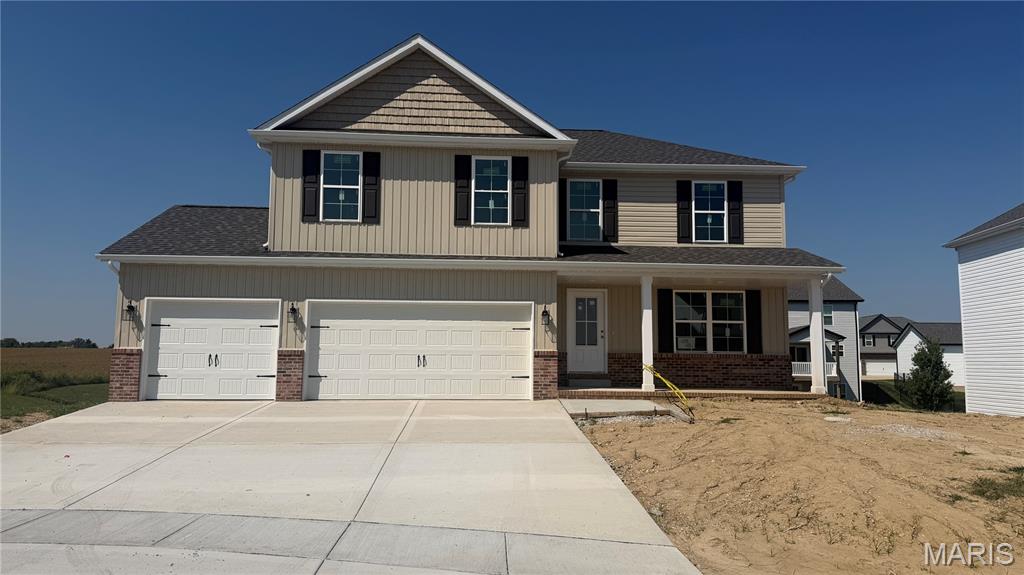 Professional Photos Coming Soon! Introducing 624 Middletown Court - The Hazelwood by New Tradition Homes. This brand new build sits in a prime O'Fallon location, just minutes from Scott Air Force Base and roughly 20 minutes from downtown St. Louis. With an October 2026 completion, timing works in your favor - avoid the summer moving crunch and get settled well ahead of the holidays.

This two-story home offers 5 bedrooms and 3.5 bathrooms, combining upscale style with everyday practicality. A fully finished basement adds valuable extra living space, and the thoughtful layout creates an easy flow between open areas for gathering and quiet spaces for retreating.

The Hazelwood stands out in the details. His-and-her walk-in closets are oversized for extra storage and personal space, and a large walk-in pantry keeps the kitchen running smoothly, whether it's a weeknight dinner or hosting a crowd. Every element of this floorplan is designed for real life - comfortable, functional, and full of style.

Commuters and homebuyers alike will appreciate the easy access to major highways, along with nearby shopping, dining, and everyday essentials just minutes away. Close enough to Scott AFB for military families and PCS moves, yet well-connected to St. Louis for those who need the commute this location works for nearly anyone. It's also a great option for retiring or separating service members settling into their next chapter, or buyers looking to secure a home now ahead of next year's peak season.

Backed by a 1-year builder home warranty for extra peace of mind, this move-in-ready New Tradition Home won't stay on the market long!