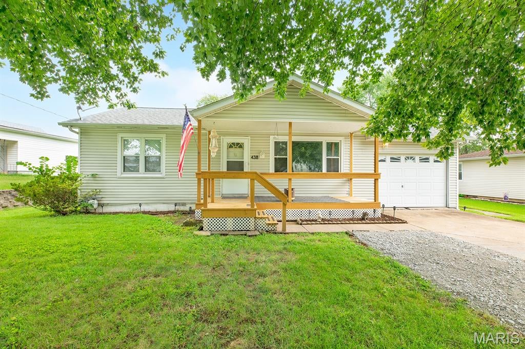 Welcome home to this inviting 2-bedroom, 1-bath property in East Alton, IL! Enjoy a large front deck, perfect for relaxing or entertaining, along with a newly renovated bathroom and the convenience of main-level laundry. New carpet in the secondary bedroom! Washer and dryer are included with the home! Additional features include an attached 1-car garage and a utility shed for extra storage. Don't miss your opportunity to make this well-equipped home your own!