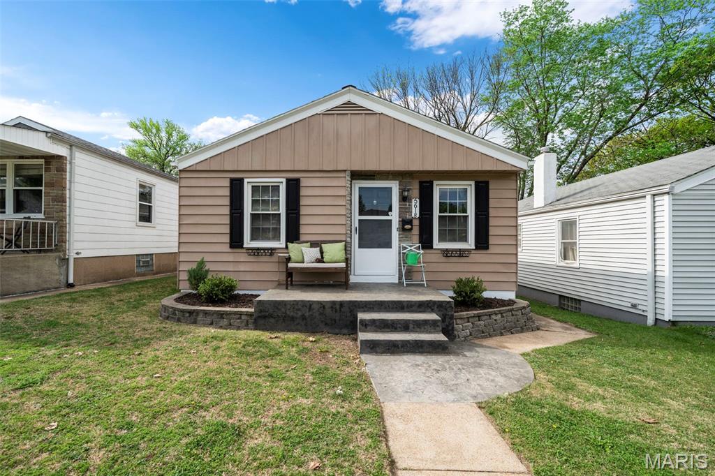 (c.) 1952: Don’t miss this charming and well-updated Northampton bungalow offering the perfect blend of character, functionality, and location. This 2-bedroom, 1.5-bath home welcomes you inside with a newer stamped concrete front porch. Inside, you’ll find a charming living room with oak hardwood floors and a convenient pass-through breakfast bar that opens to a large, beautifully updated kitchen featuring 42" cabinetry, stone countertops, stainless steel appliances and pantry. Two comfortable bedrooms flank an updated full bath on the main level. The partially finished lower level adds valuable living space, ideal for a rec room / 2nd living room, a home office, or flex space, along with a half bath, laundry area, utility room, and plenty of storage. Step out back to enjoy a fully fenced backyard with newer low-maintenance vinyl privacy fence and a spacious deck with a wooden pergola—perfect for entertaining or unwinding. Off-street parking accommodates up to three vehicles, including a detached one-car garage with opener. Located just steps from Tilles Park and close to popular local favorites like Knead Bakehouse, Blueprint Coffee, Menya Rui, Mestiza, Trattoria Marcella, Donut Drive-In & many more!