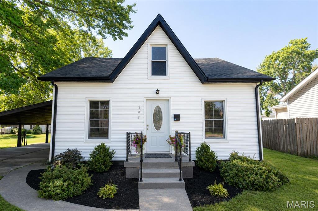 Welcome home to this charming home, conveniently located near downtown O’Fallon! Step inside to find updates throughout and a bright, inviting kitchen featuring lofted ceilings and a skylight that fills the space with natural light. Outside, you’ll find a carport and a deep backyard with plenty of space to enjoy. Enjoy the comfort knowing a brand-new roof has been put on in August of 2026! The location is hard to beat—just a short walk to the farmers market, local shopping, dining, and all that Downtown O’Fallon has to offer, while being approximately 15 minutes from Scott Air Force Base. Cute, updated, and truly move-in ready, this home is ready for its next owner! Buyer or buyer's agent to verify MLS info.