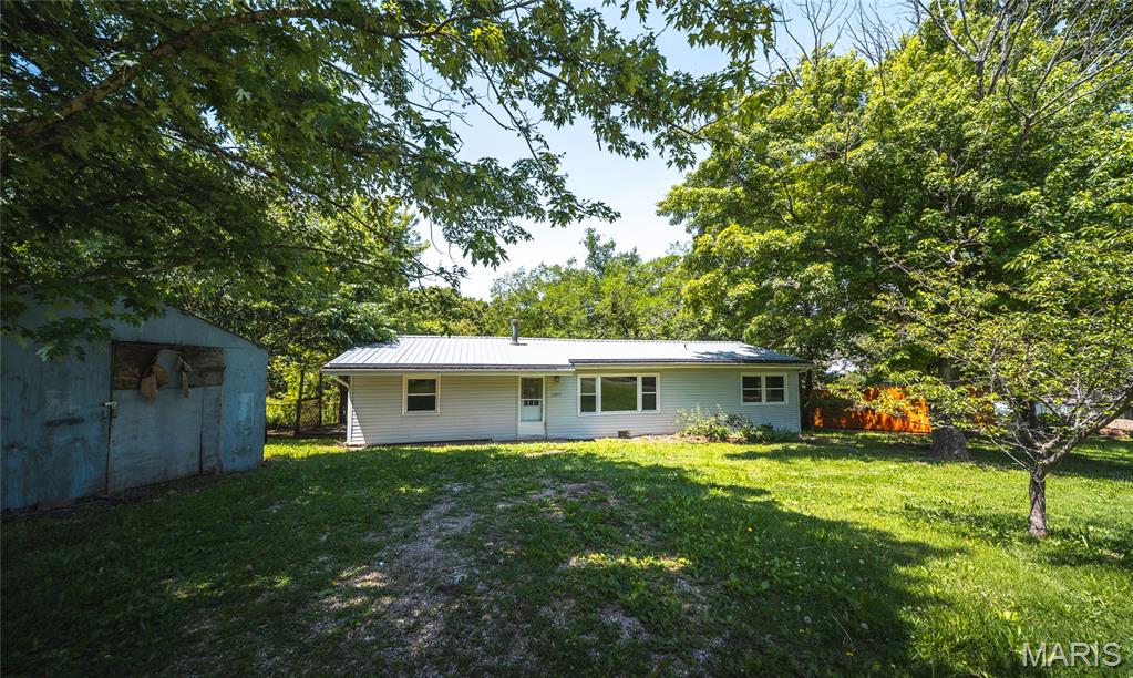 Completely remodeled and move-in ready, this charming 3-bedroom, 1-bath home in Rolla offers the perfect blend of modern style and everyday comfort. From the moment you walk through the door, you’ll love the bright, open floorplan designed for both relaxing and entertaining. Luxury vinyl plank flooring flows seamlessly throughout the home, creating a clean, cohesive feel with durability built for everyday living. The heart of the home is the beautifully updated kitchen, featuring brand-new cabinetry, sleek stainless steel appliances, and warm butcher block countertops that add both character and functionality. Whether you’re cooking dinner for family or hosting friends on the weekend, this space was designed to bring people together. The remodeled bathroom showcases modern finishes and thoughtful updates, giving the home a fresh, contemporary feel from top to bottom. Step outside and enjoy your own private backyard retreat — perfect for pets, kids, gardening, or simply unwinding after a long day. Located just north of Rolla, this home offers convenient access to shopping, dining, schools, and Missouri S&T while still providing the comfort of a quiet residential setting. If you’ve been searching for a turnkey home with style, charm, and modern upgrades, this is one you won’t want to miss. Schedule your private showing today!