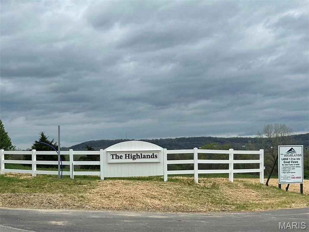 THE HIGHLANDS is  Franklin Counties Latest and Finest 1-3+ acre Custom Home  20  Lot Development . Truly an enclave with few neighbors.  You may choose from a variety of Open & Wooded lots all with  mostly level building sites and gently sloping rear yards, perfect for rear walk out some overlooking common ground, lake, and or woods.  Enjoy a Country atmosphere with ALL underground city services ,City Sewer, water, telephone, Electric, Spectrum Internet, Spire Natural gas ,Incredible endless Hilltop views, wide paved streets maintained by the HOA, Protective Covenants with an emphasis on quality and style.Your builder of choice with no time frame to build. 
All within easy HWY 44 access. There is nothing like it in the area except the developers previous development next door "Longview Meadows".  Lot 15 is one of the largest lots on one of the highest points  and iI has the perfect building site with natural woods and a gentle rear walkout. The woods are thick so bring a coat with gloves and walk this lot . All corners are marked.
 Sales Brochure, restrictions and topographic maps available upon request or pick up a sales brochure at the LOT Information mailbox at the entrance  Minimum home size is
1800 sqft . HOA Fees are $400/annum. This development was developed by the same developer who created Longview Meadows next door so please drive thru to see how The Highlands will look like once completed.