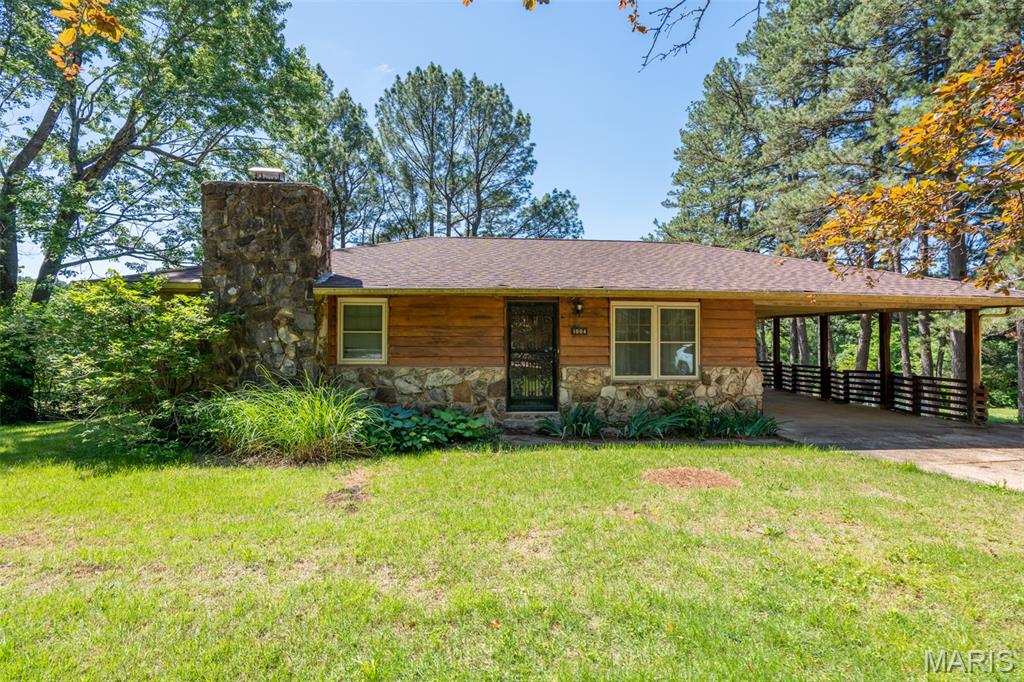Check out this really nice affordable home just outside the city limits of Doniphan! This nice home features a nice open floor plan with 3 beds and 2 baths with plenty of extra room including additional family room with rock fireplace in the basement!! The walk-out basement features one of the bedrooms and one of the bathrooms so it would be ideal for possible separate living situations or family!! You will be hard pressed to find more square footage in a nicer area for the money! Call today to setup your showing!!
