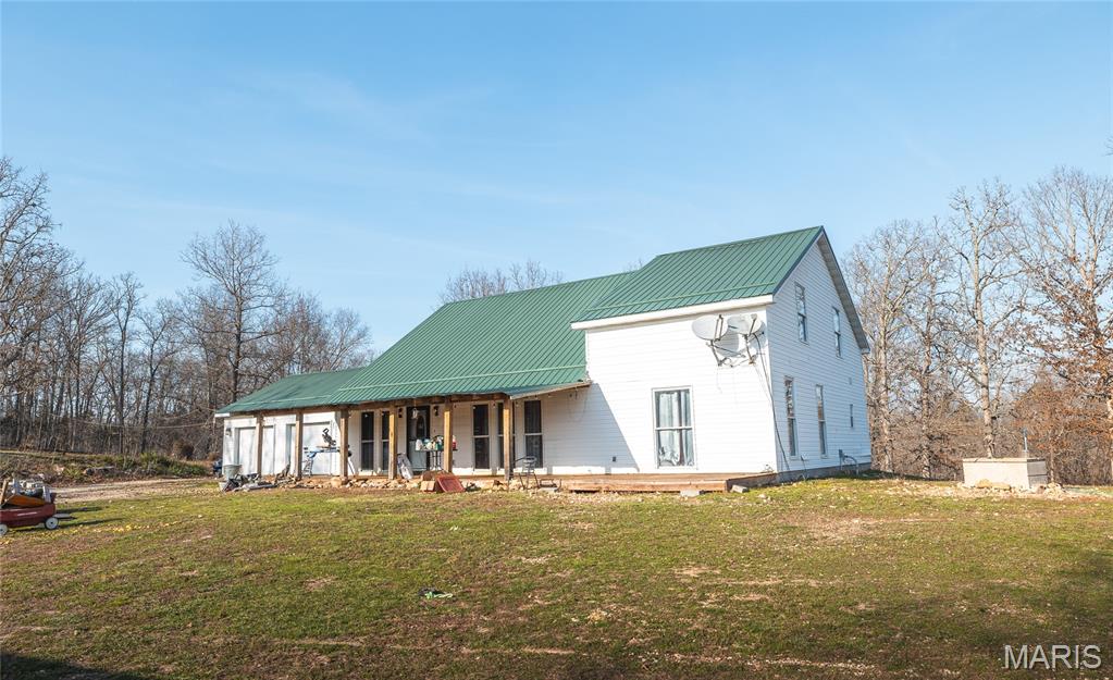 Charming 4-bedroom, 2.5-bath farmhouse nestled on nearly 20 acres, offering the perfect blend of peaceful country living and functional farm potential. This beautiful property is ideal for anyone looking to start or expand a farm or create their own private retreat.

The home features a warm and inviting layout with covered front and rear porches—perfect for enjoying the scenic surroundings and quiet setting. The land is well-suited for livestock or recreation, with multiple outbuildings, a barn, and fenced areas already in place.

Recent updates include a newer roof (2019) and a well pump that’s just one year old, giving added peace of mind. Washer, dryer, and chest freezer will all stay with the home, making this property move-in ready with added value.

Conveniently located just 20 minutes south of Rolla with easy access to US-63, you’ll enjoy the perfect balance of rural privacy and accessibility.