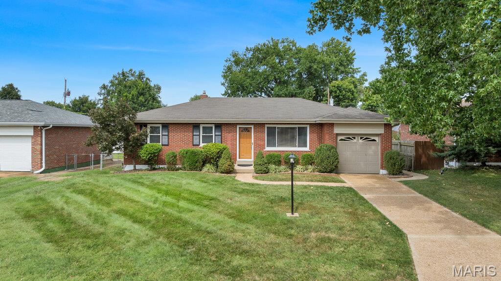 Welcome to this charming and beautifully maintained 3-bedroom, 1-bathroom, 1-car garage home nestled in the desirable Lavinia Meadows community and located in the sought-after Lindbergh School District! From the attractive four-sided brick exterior to the thoughtfully refreshed interior, this home offers a wonderful combination of comfort, versatility, and convenience. Inside, you’ll find newer flooring, fresh paint, updated lighting, modern door hardware, and refreshed plumbing fixtures throughout. The spacious lower-level recreation room adds valuable flexible living space and is perfect for entertaining, family gatherings, a home office, exercise room, or a cozy retreat. Step outside to enjoy the level, fully fenced backyard featuring a patio that’s ideal for morning coffee, summer gatherings, or relaxing outdoors. A storage shed provides convenient additional space for tools, lawn equipment, and seasonal items. Located close to schools, shopping, dining, parks, and everyday conveniences, this home offers both a fantastic setting and an inviting place to call home. With its brick construction, desirable location, tasteful updates, and flexible living spaces, this Lavinia Meadows gem is one you won’t want to miss!