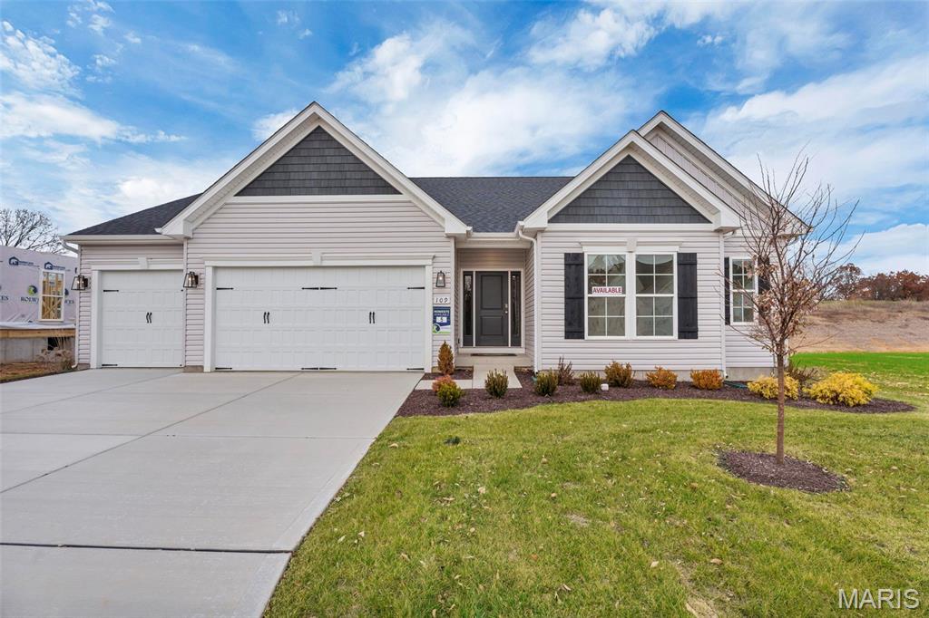 Welcome to the Canterbury ranch at 109 Sommers Creek Court in Creekside at Sommers, O’Fallon, MO! This popular and well-designed floor plan is a homeowner favorite, offering a functional split 3-bedroom, 2-bath layout ideal for modern living. With 9’ ceilings and an open concept design, the home feels bright, spacious, and inviting throughout. The great room serves as the heart of the home, featuring a gas fireplace and a sunlit dining area that flows seamlessly into the gourmet kitchen—complete with quartz countertops, an oversized island, and a large walk-in pantry and 42 inch cabinets. The owner’s suite is a true retreat, accessed through elegant double doors and featuring a spa-inspired bath with a garden tub, separate shower, and a spacious walk-in closet. Additional highlights include a main-floor laundry/mudroom and a 3-car garage for ample storage. Situated in a desirable O’Fallon community near shopping, dining, and top-rated schools, this home perfectly blends comfort, style, and convenience. Contact us today for more information or to schedule your private tour—make this beautiful home yours! Photos and virtual tour may depict similar home.