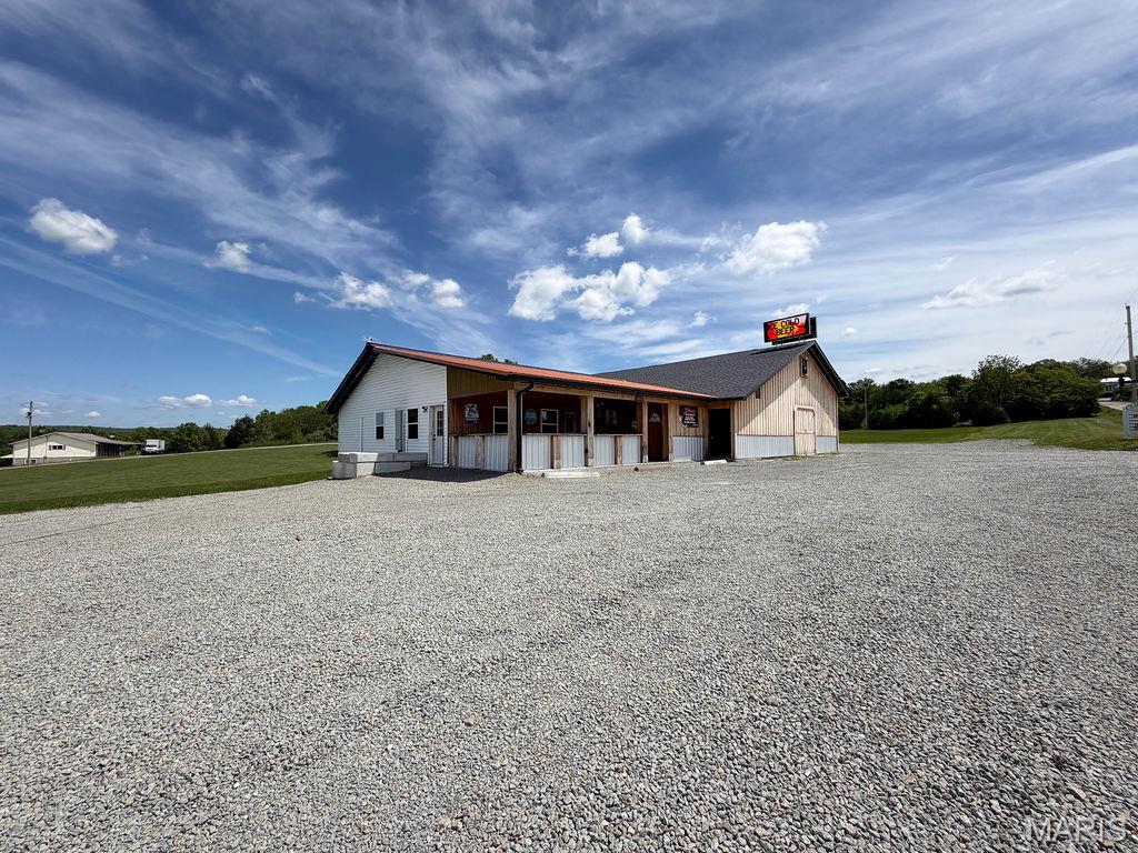 Turnkey Bar, Restaurant & Event Venue on 4+ Commercial Acres!
Cornerstone Bar & Grill is a well-established, family-owned bar, restaurant, and entertainment venue strategically located just outside the Goose Creek Lake subdivision. The property consists of two commercial corner lots totaling just over four acres and features nearly 6,000 square feet of renovated main-level space, offering exceptional flexibility and strong ongoing income potential.
The property includes a fully renovated, high-capacity commercial kitchen designed for efficient, high-volume service. Equipment includes premium cooking appliances, pizza preparation station, fryers, ranges, modern hood systems, prep tables, and all necessary infrastructure for full-scale food service. The kitchen is fully operational and turnkey, allowing uninterrupted continuation of business operations.
The bar, dining, and reception areas are designed to accommodate both daily service and large-scale events. Interior features include:
Quality finishes throughout
State-of-the-art sound system
Multiple pool tables
Adult gaming machines
Flexible seating and open floor space
The venue has successfully hosted events including live music, private parties, & bingo nights.
The building is well maintained and constructed for year-round comfort with newer HVAC systems, high-quality insulation, and commercial-grade ceiling fans. A covered front porch with ample seating and multiple televisions provides additional outdoor entertainment space. Parking lot to hold 200+ all types of vehicles.
The expansive lower level provides additional functionality and value, featuring:
private living quarters, office with onsite surveillance control center, substantial storage space, two attached garage space & bathroom. Lower level area offers flexibility for owner occupancy, on-site management, staff accommodations, rental use, or future business opportunities.
Location!!Location!!! Cornerstone Bar & Grill is located at the Goose Creek Lake entrance and within walking This is an Investment Opportunity with a prime location, modern upgrades, established operations, and multiple revenue streams, Cornerstone Bar & Grill represents a turnkey opportunity in a growing French Village Community. The property is well suited for continued operation, expansion, or repositioning by new ownership seeking a high-traffic restaurant and entertainment venue. Bonus feature - this is a Goose Creek lot with Lake access- enjoy on your off days the lake amenities. Seller is ready to see offers and get this SOLD!