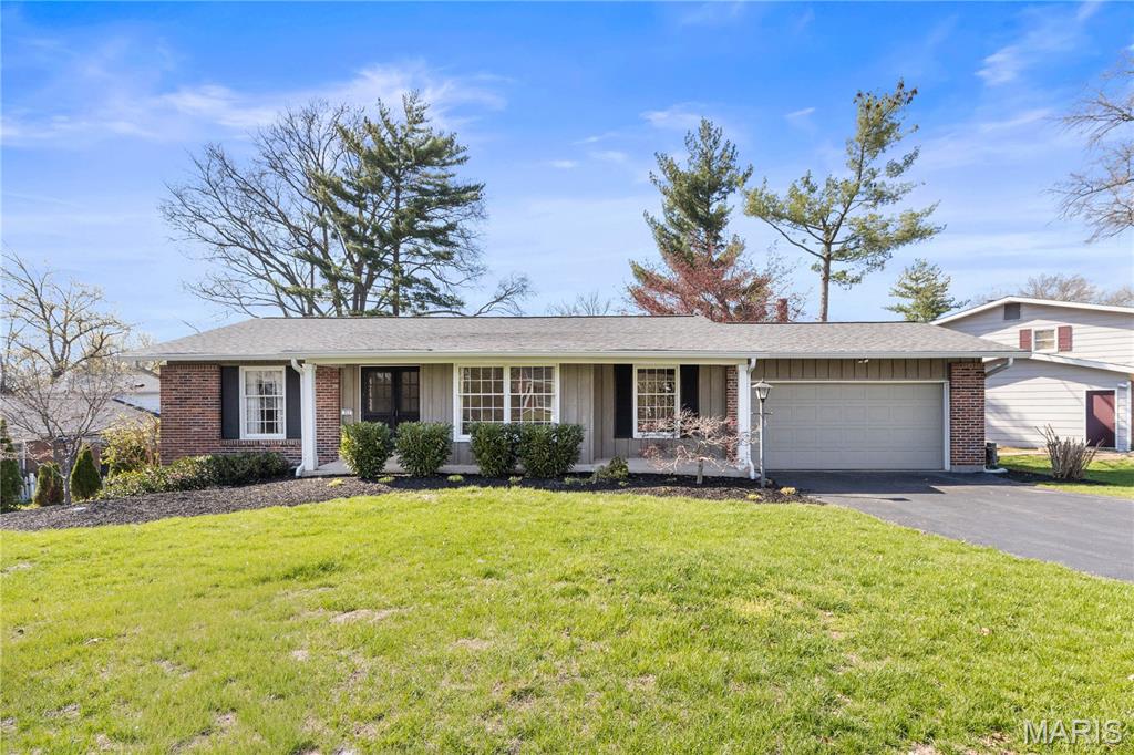 Located in the highly sought-after Cherry Hill Estates, this well-maintained 4 bedroom, 3 full bath ranch home has been lovingly cared for by its original owner. A welcoming double-door entry opens to a spacious foyer and living room/dining room combination, ideal for everyday living and entertaining. The cozy family room features a wood-burning fireplace, wet bar, built-in bookcases, and sliding glass door leading to a large patio overlooking the fenced backyard—perfect for outdoor gatherings.

The kitchen is equipped with stainless steel appliances, including a refrigerator, dishwasher, microwave, and gas range. The primary suite offers two closets and a private bath with shower and linen closet, while three additional bedrooms complete the main level.

The finished lower level provides even more living space with a second family room, built-in bar, recreation area with pool table, and a full bathroom. An unfinished area offers abundant storage.

Recent updates include a water heater (2018), furnace (2023), roof (2023), and some newer rear windows (2024). This home offers space, functionality, and a fantastic location—don’t miss your opportunity to make it yours!