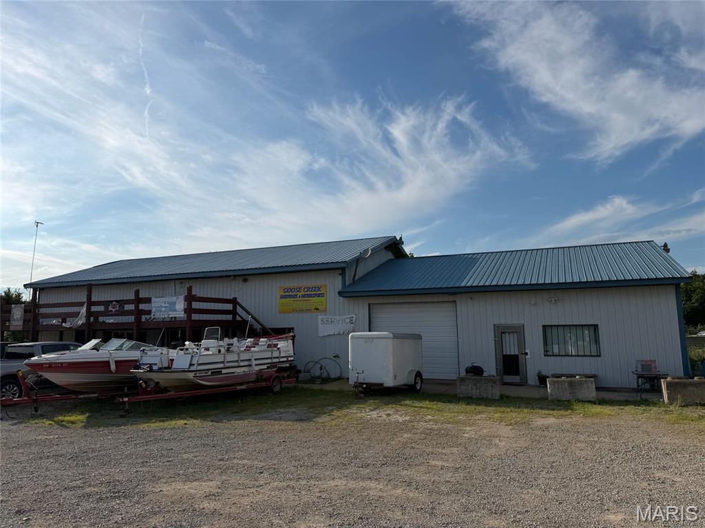 This 1.7 acres with a 2400 sq. ft. building has lots of potential.  Building is currently set up for 2 separate business, an apartment, and a 1 bay garage.
Many possibilities with this property. Located close to Goose Creek entrance.  Call today for a viewing.
