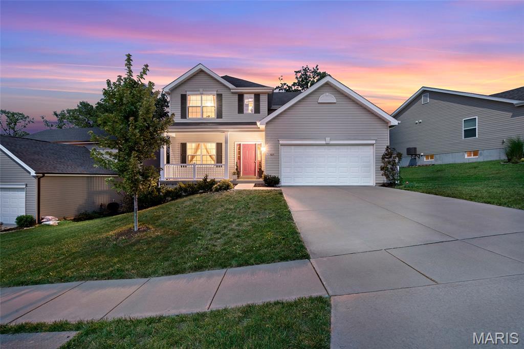 Move-In Ready with a Private Backyard Setting in the Highly Sought-After Wentzville School District! This spacious 4-bedroom, 2.5-bath home offers the perfect combination of comfort, functionality, and location. Designed with everyday living and entertaining in mind, the open floor plan features a formal dining room, a bright and inviting great room filled with natural light, and durable luxury vinyl plank flooring throughout the main level.

The kitchen is the heart of the home, complete with a large breakfast bar island, breakfast room, stainless steel appliances, and the refrigerator included. Just off the garage, you'll find a convenient laundry/mud room with the washer and dryer also included.

Step outside and unwind on the maintenance-free deck overlooking private, tree-lined common ground where you can enjoy peaceful views and frequent visits from local wildlife. The fully fenced backyard is designed for both relaxation and gardening, featuring raised planting beds, a rain barrel, and a storage shed built on a platform.

Upstairs, the spacious primary suite offers a large walk-in closet and private bath with a dual vanity and walk-in shower. Three additional generously sized bedrooms share a full hall bath with an extended vanity, providing plenty of room for family, guests, or a home office.

The walk-out lower level is ready for your personal touch, offering endless possibilities for future living space, recreation, or storage.

Conveniently located just minutes from shopping, restaurants, parks, and major highways, this home offers the space you need, the backyard you've been looking for, and the award-winning Wentzville School District buyers love. The sellers are also open to negotiating the inclusion of additional personal property with an acceptable offer.

Schedule your showing today and see everything this home has to offer!