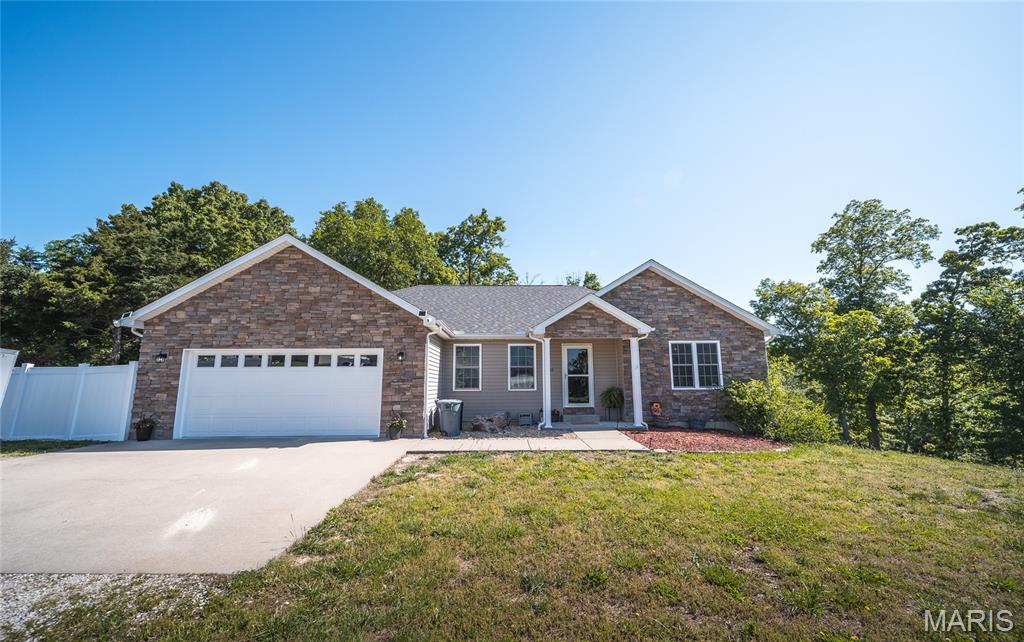 Check out this beautiful new listing!!! Located at the end of the cul-de-sac in Ridge Creek estates, sits this well maintained 4 bed + 3 bath, ranch style home. Home sits on the largest lot in the subdivision at a little over an acre, beautiful land cleared to a small creek, and very private. Features of this home include an open floor plan, vaulted ceilings, split bedroom plan, main level master suite, hard wood floors, a large kitchen w/stainless appliances, and a center island. Basement is mostly finished with a 4th non conforming bedroom, full bath, huge living room space, a John Deere garage, and additional storage. Other features include a large back deck, concrete patio, 2 car garage, new roof, privacy fence, and more! Pride in ownership can be seen throughout!! You don't want to miss this one, call today to schedule your private showing!!
