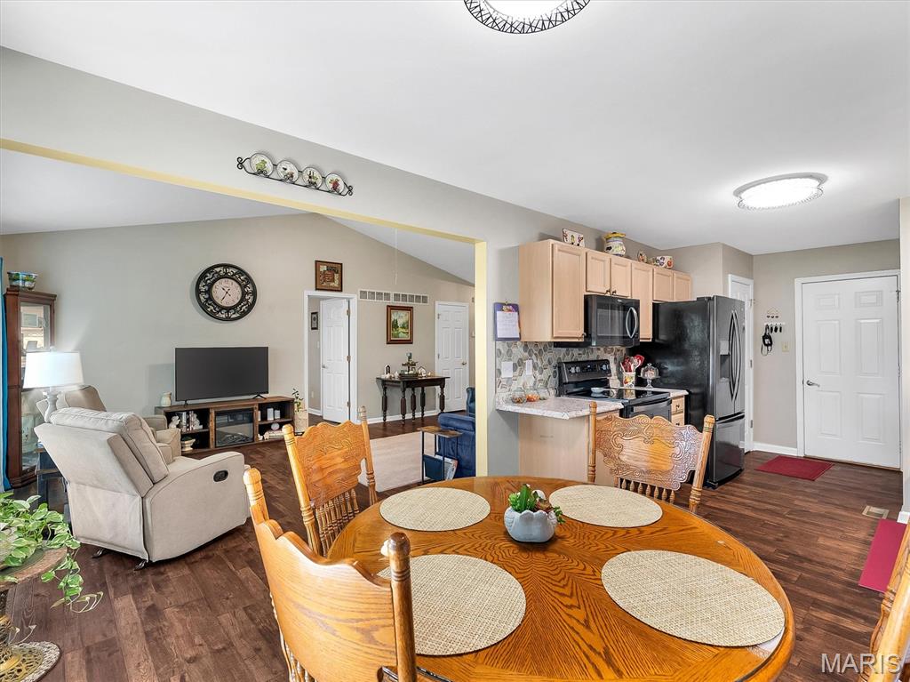 Welcome home to this beautifully maintained 2-bedroom villa in desirable Westin Place Subdivision! Bright and inviting, this home features vaulted ceilings and solid-surface flooring throughout the main living areas, creating an open and airy feel. The thoughtfully designed floor plan offers two spacious bedrooms connected by a convenient Jack-and-Jill bathroom, plus main-floor laundry for everyday convenience.
The breakfast room adjoins the well-appointed kitchen, featuring attractive countertops, stylish backsplash, easy pull-out cabinet glides, and a newer dishwasher. Step outside to the patio and enjoy peaceful views while watching local wildlife, including deer and turkey.
The finished lower level expands your living space and includes a full second bathroom, making it ideal for entertaining, guests, a family room, or home office. You'll also appreciate the abundant storage space and attached 2-car garage. Neighborhood guest parking provides added convenience for visitors.
Enjoy low-maintenance villa living in a beautiful setting with comfort, functionality, and nature right outside your door!